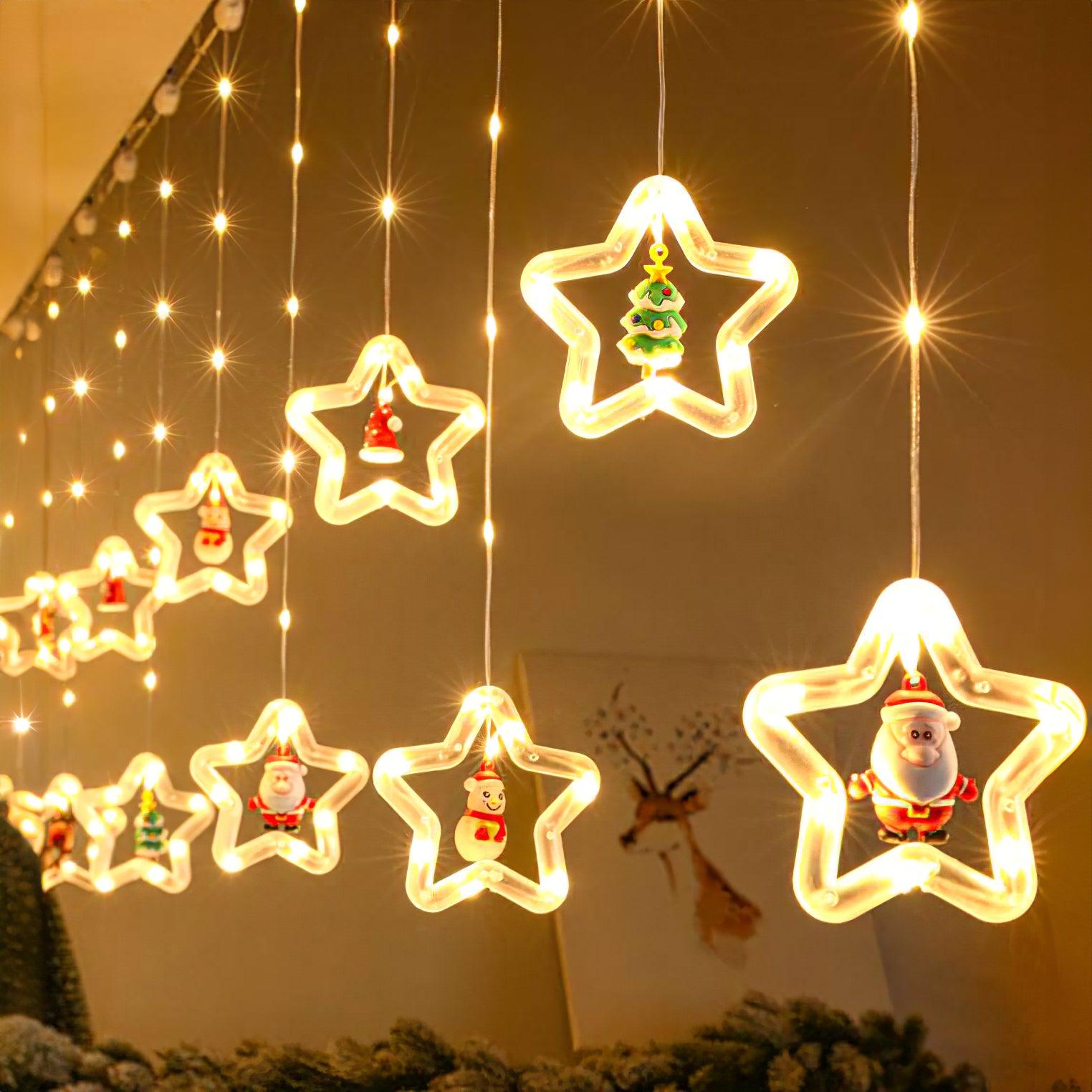 Christmas star outlines containing Santa and tree figures