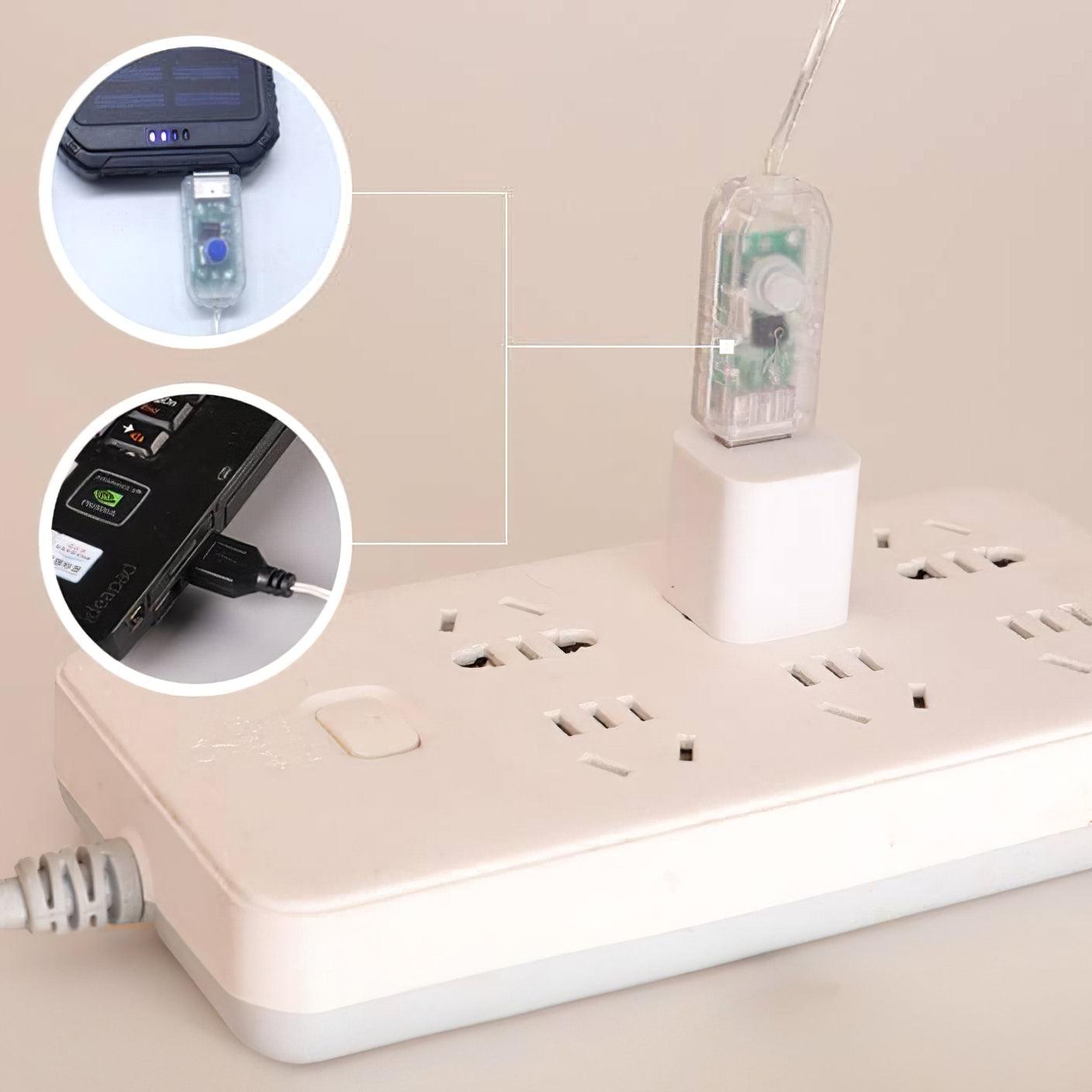 USB connector pictured with wall adapter, laptop and power bank