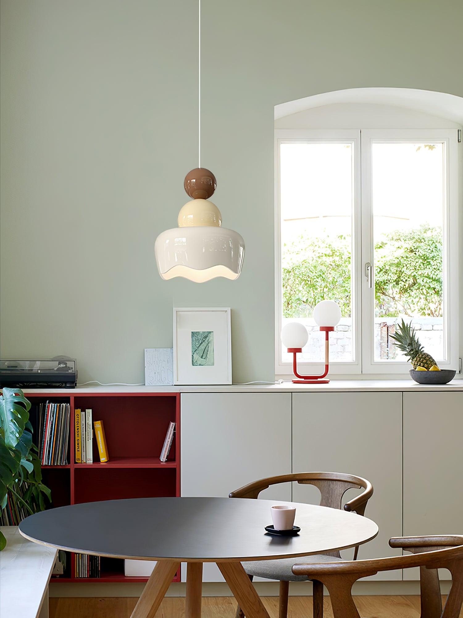 White-and-cream pendant above a dining table