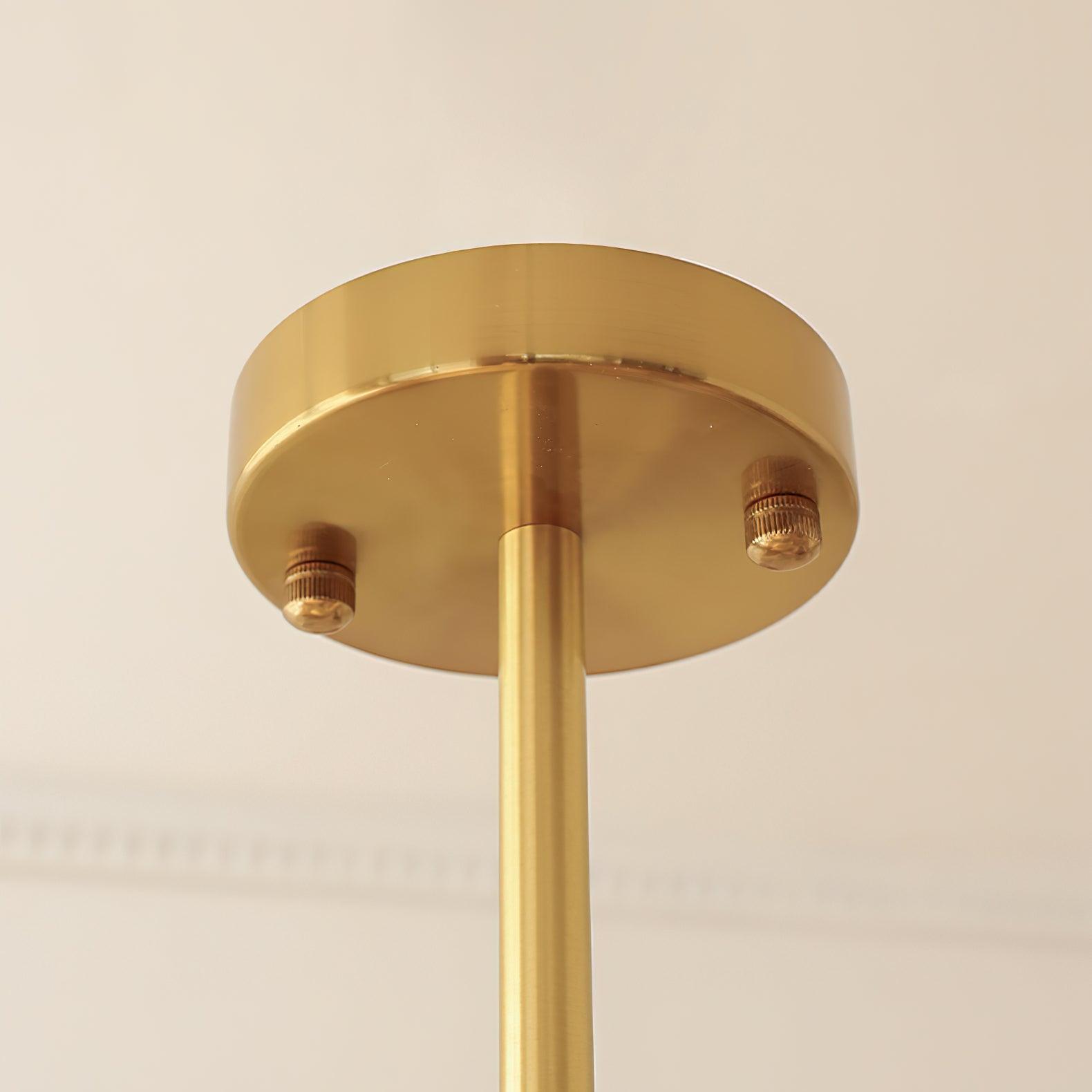 Close-up of the round gold-tone ceiling canopy with two knurled fasteners and a central rod