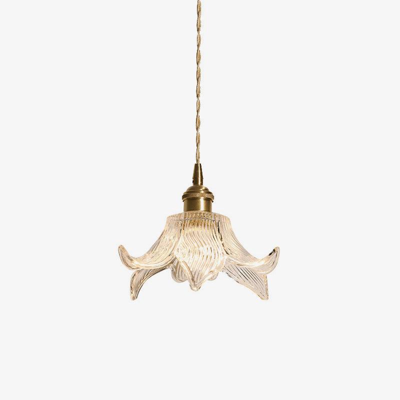 Complete petal glass pendant on white, with long twisted cord and warm light visible through its clear ribs.