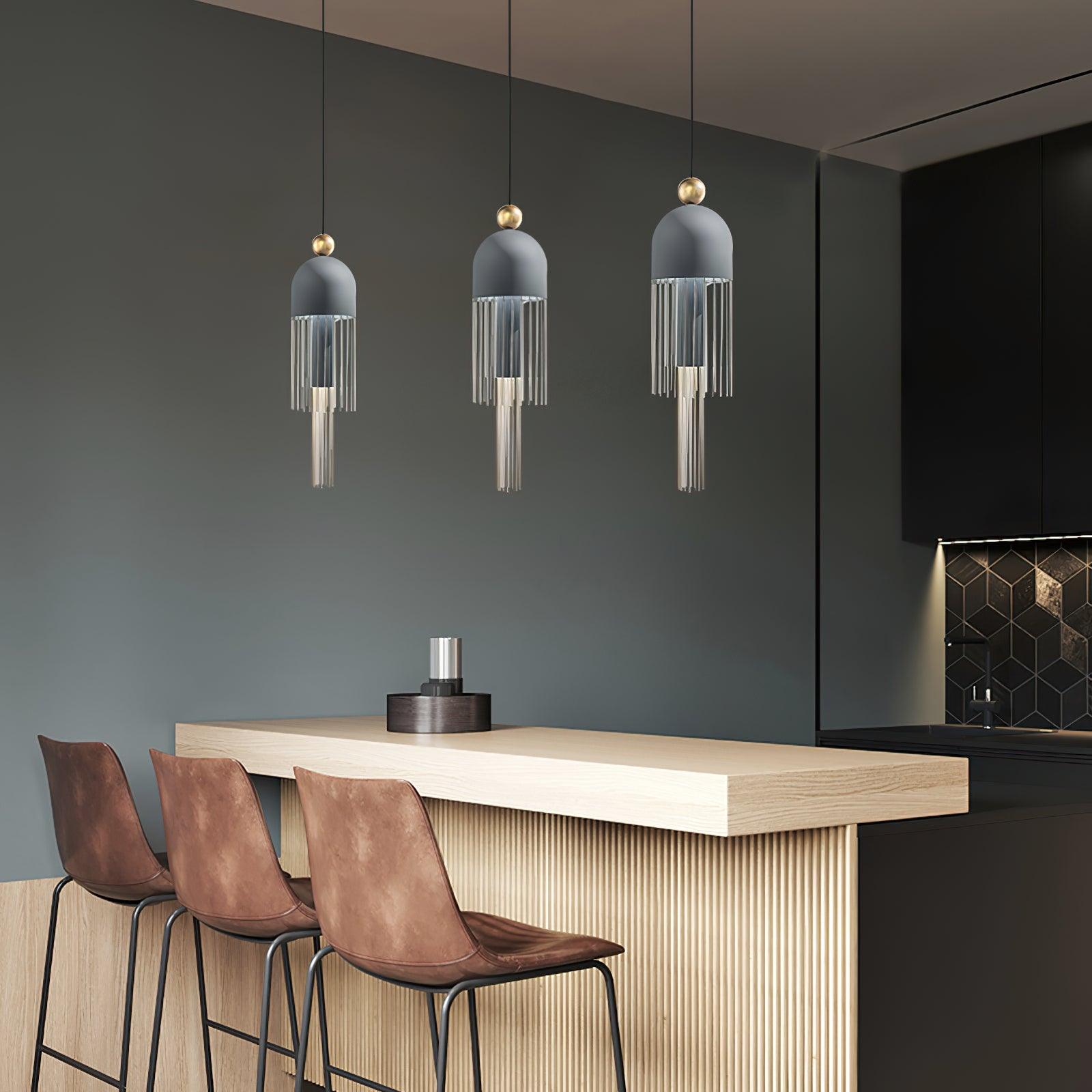 Three Style A pendants above a counter