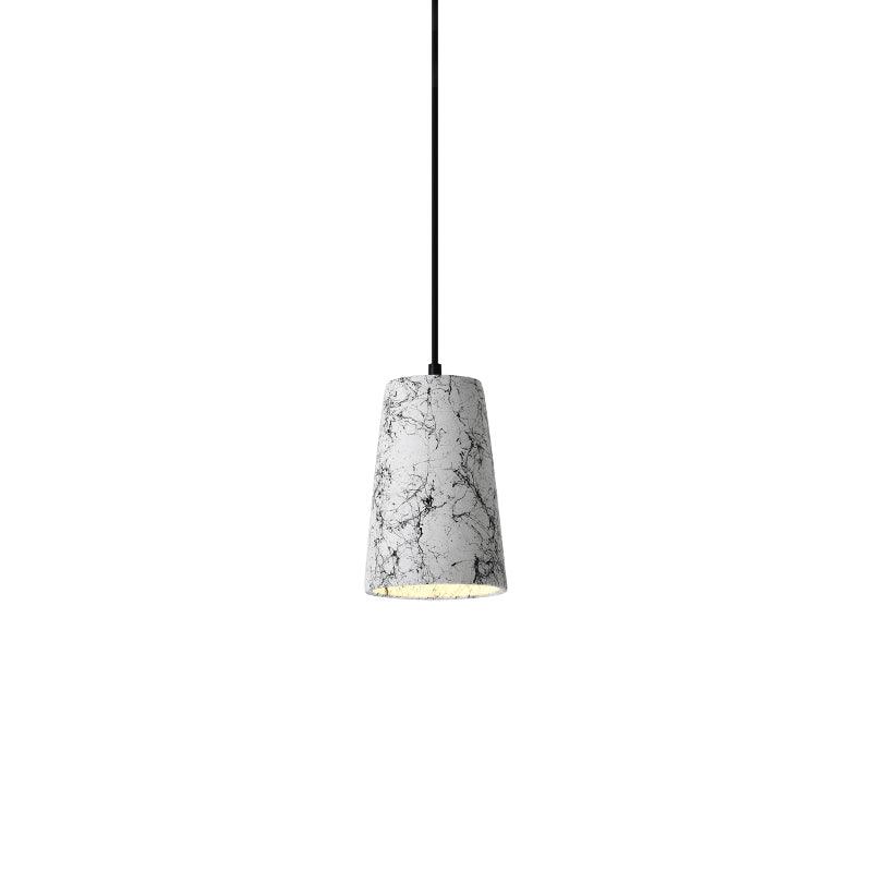 Tall tapered white cement shade with dark branching surface patterns