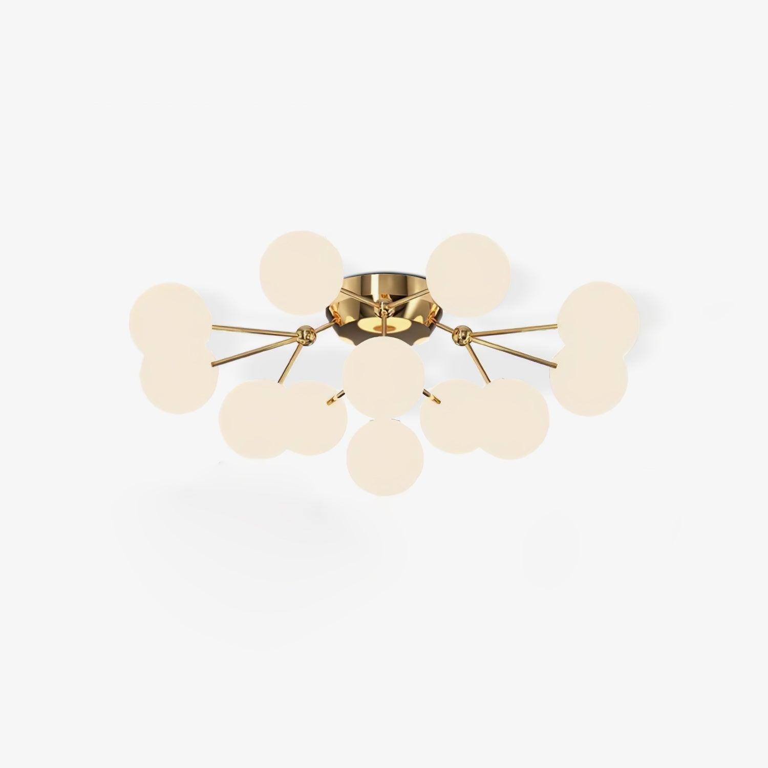Gold ceiling cluster with warm-looking white globes in a layered branching arrangement below a shallow round plate on white