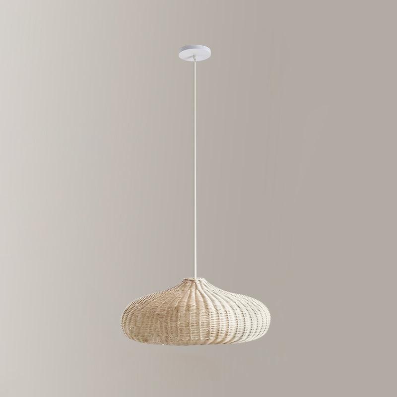 Pale low dome rattan pendant with light suspension