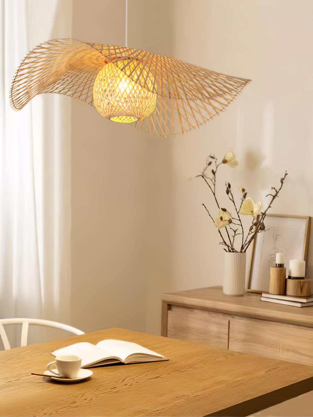 Woven-centre bamboo pendant above a wooden table