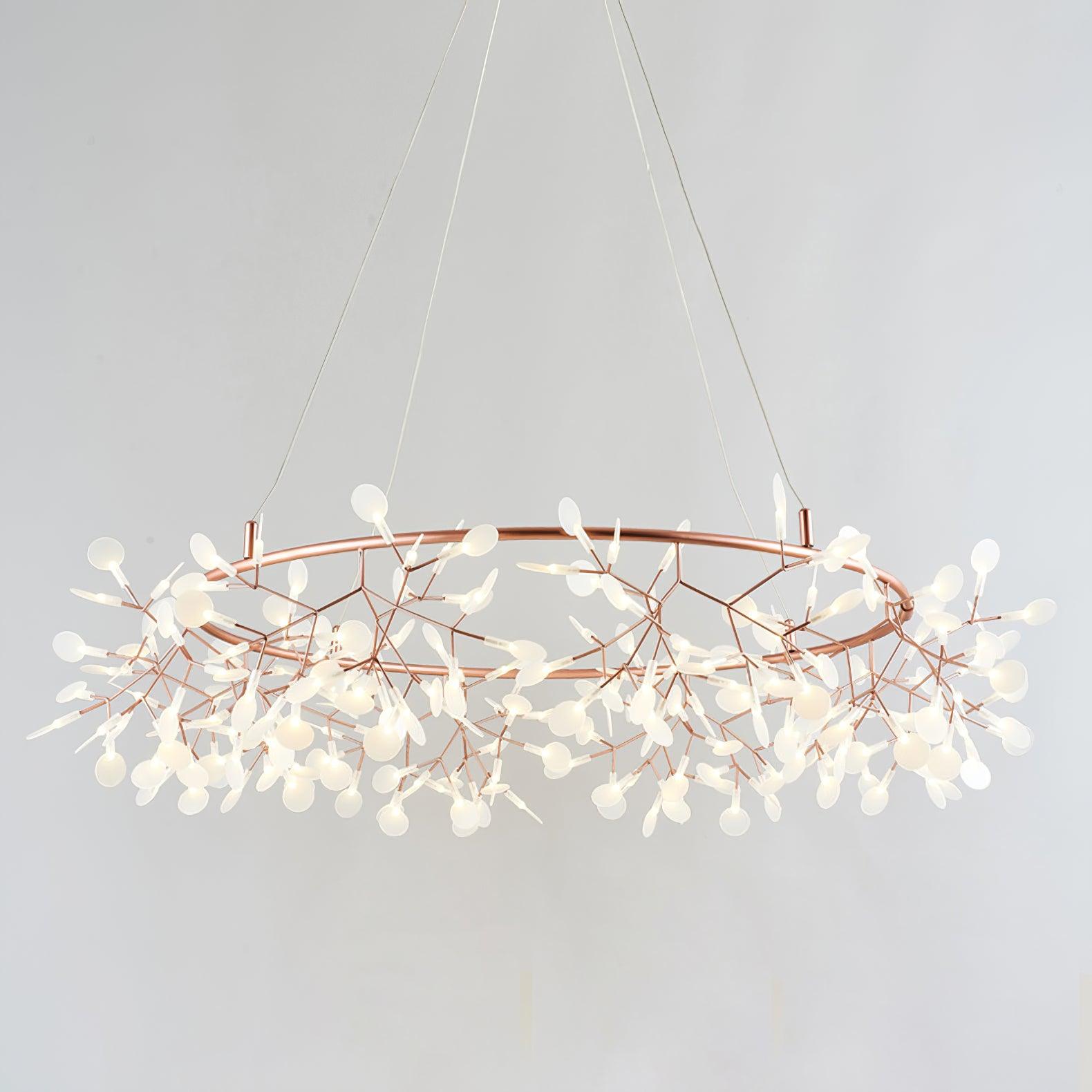 324-head Big O Firefly ring chandelier lit against a pale background, with canopy outside the frame