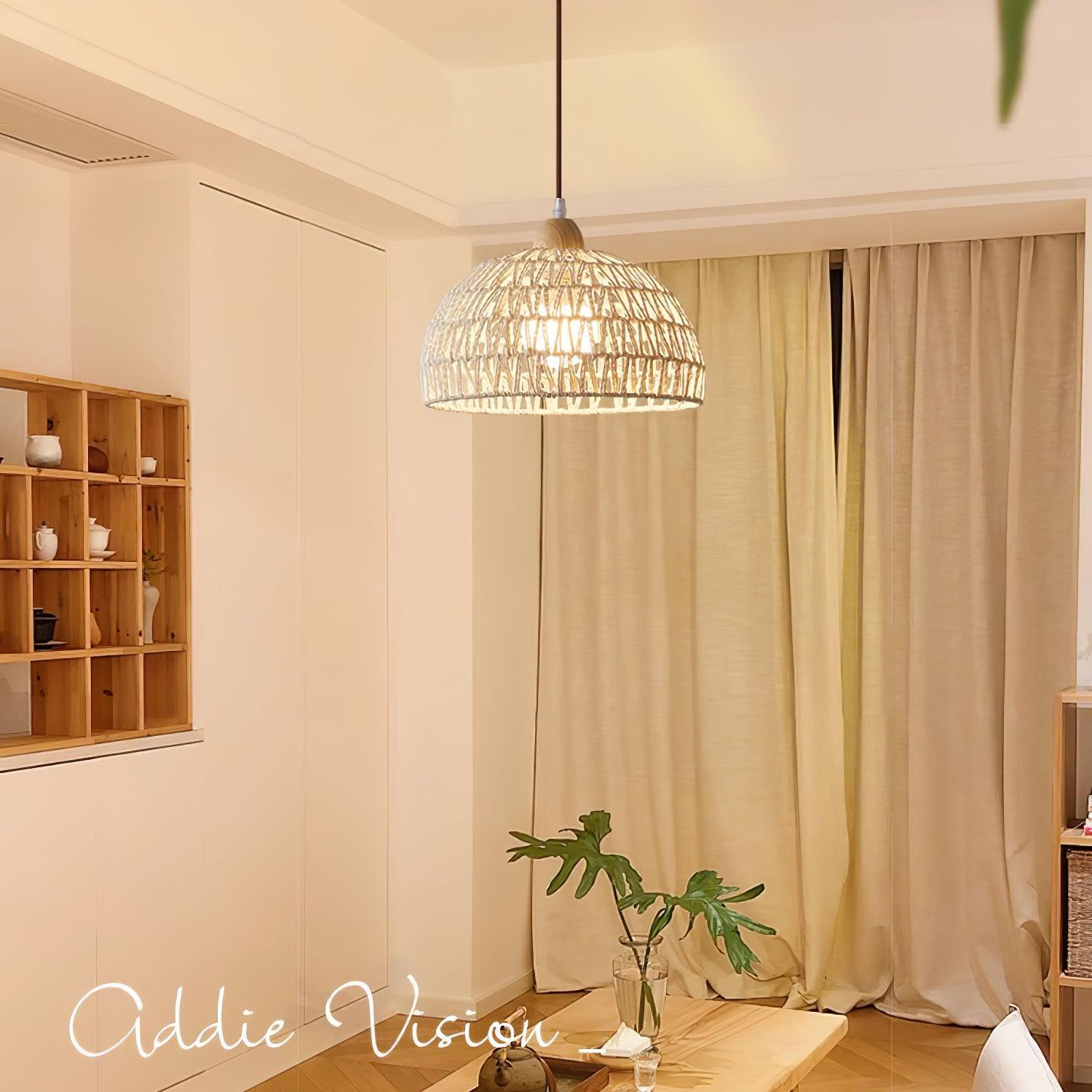 Single woven dome above a wood table with a leaf vase and teapot near curtains and wood shelving