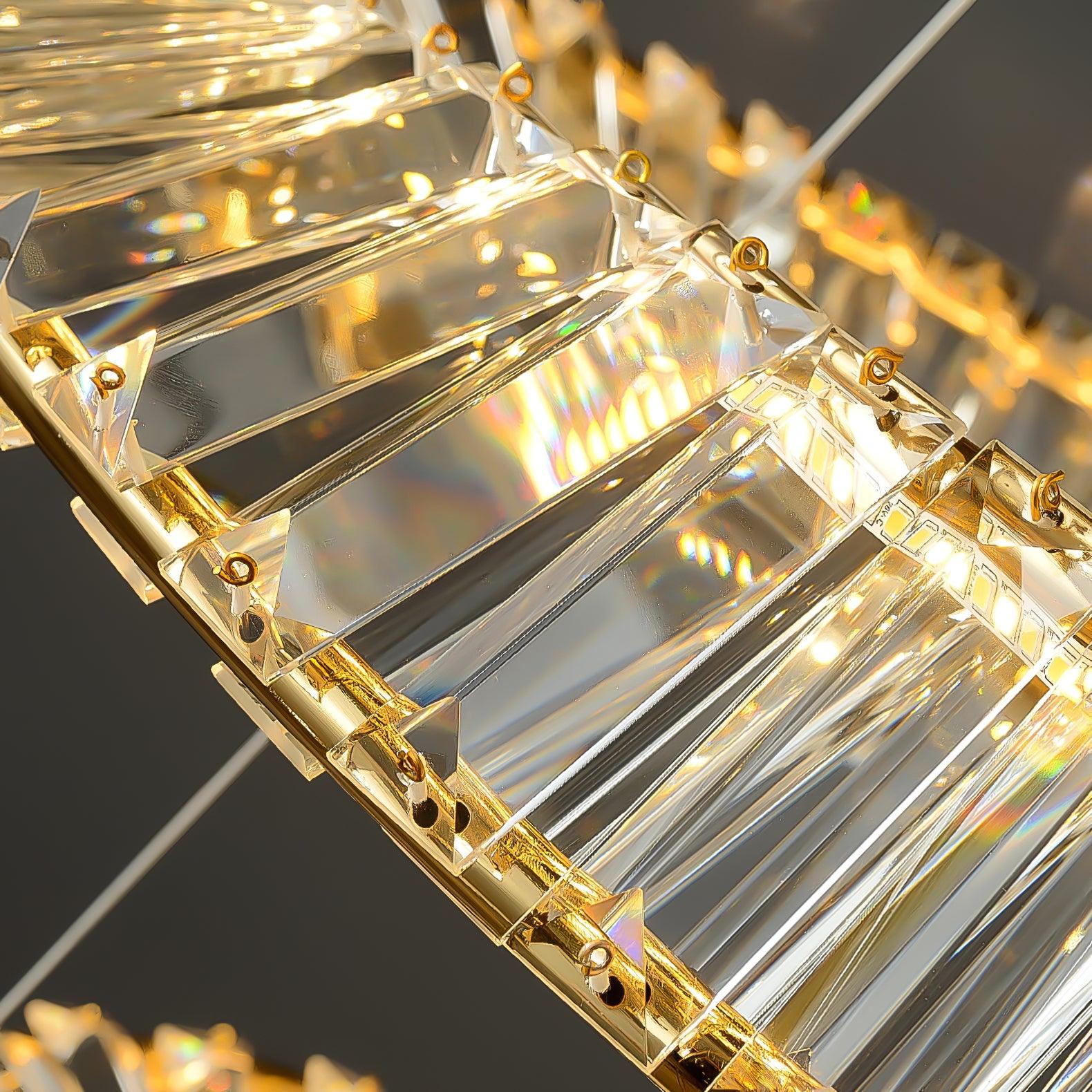 Close-up of clear faceted glass pieces, gold-tone fixings and the illuminated LED strip