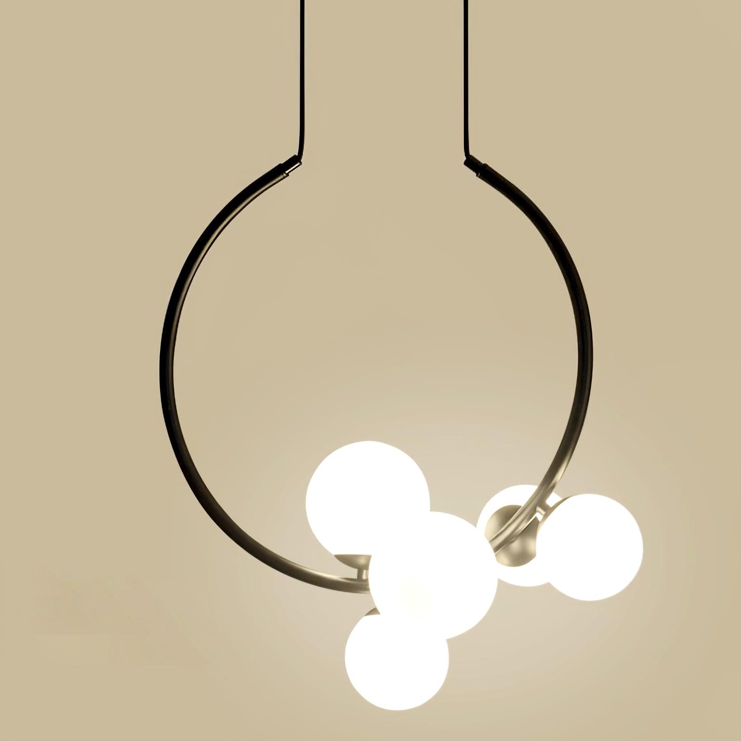 Close view of lit white globes along a Black ring