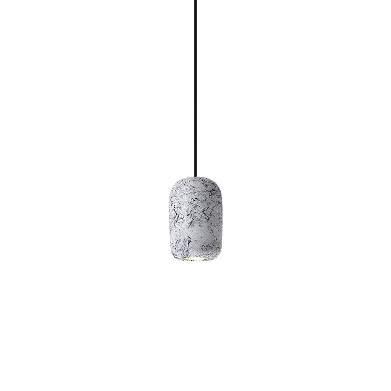 White Hubble pendant with a rounded cylindrical shade and dark branching pattern