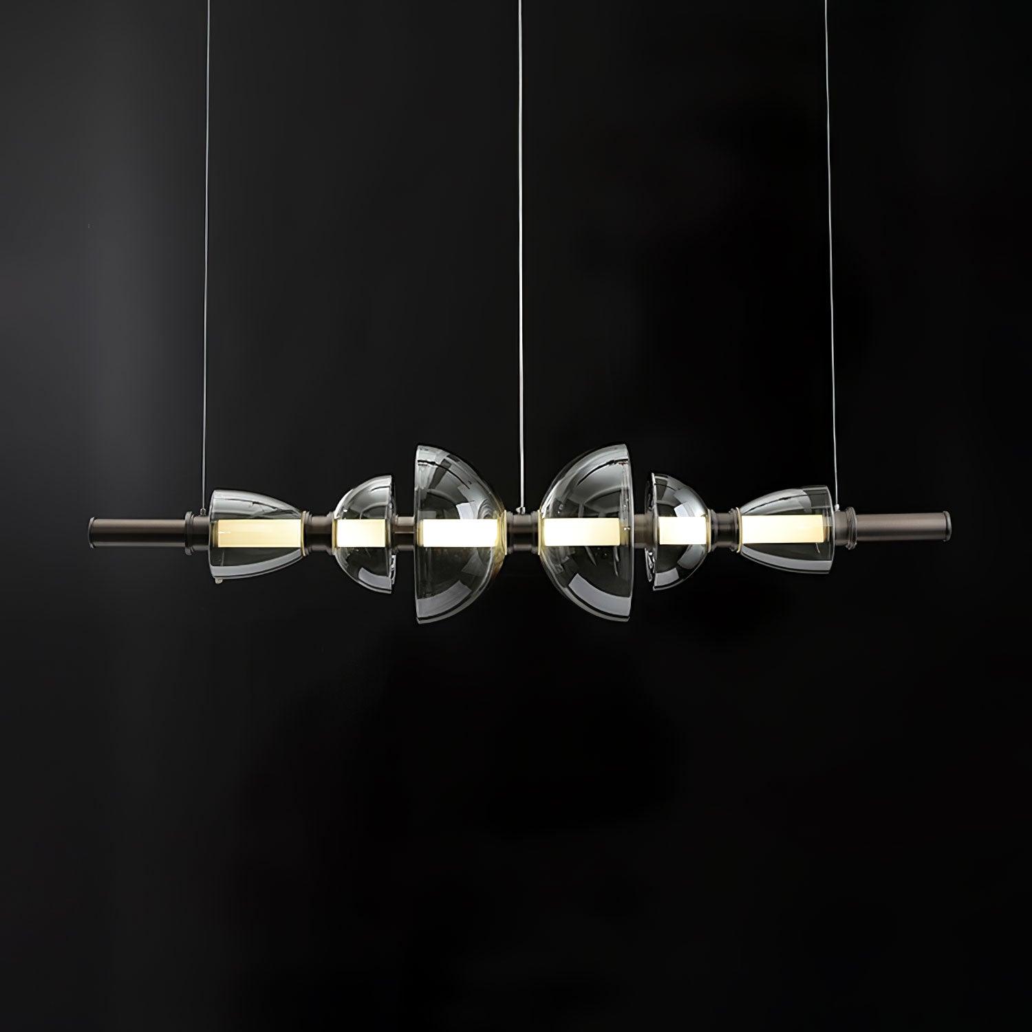 Linear Aurora pendant with smoke-grey glass and black fittings on thin suspension cables