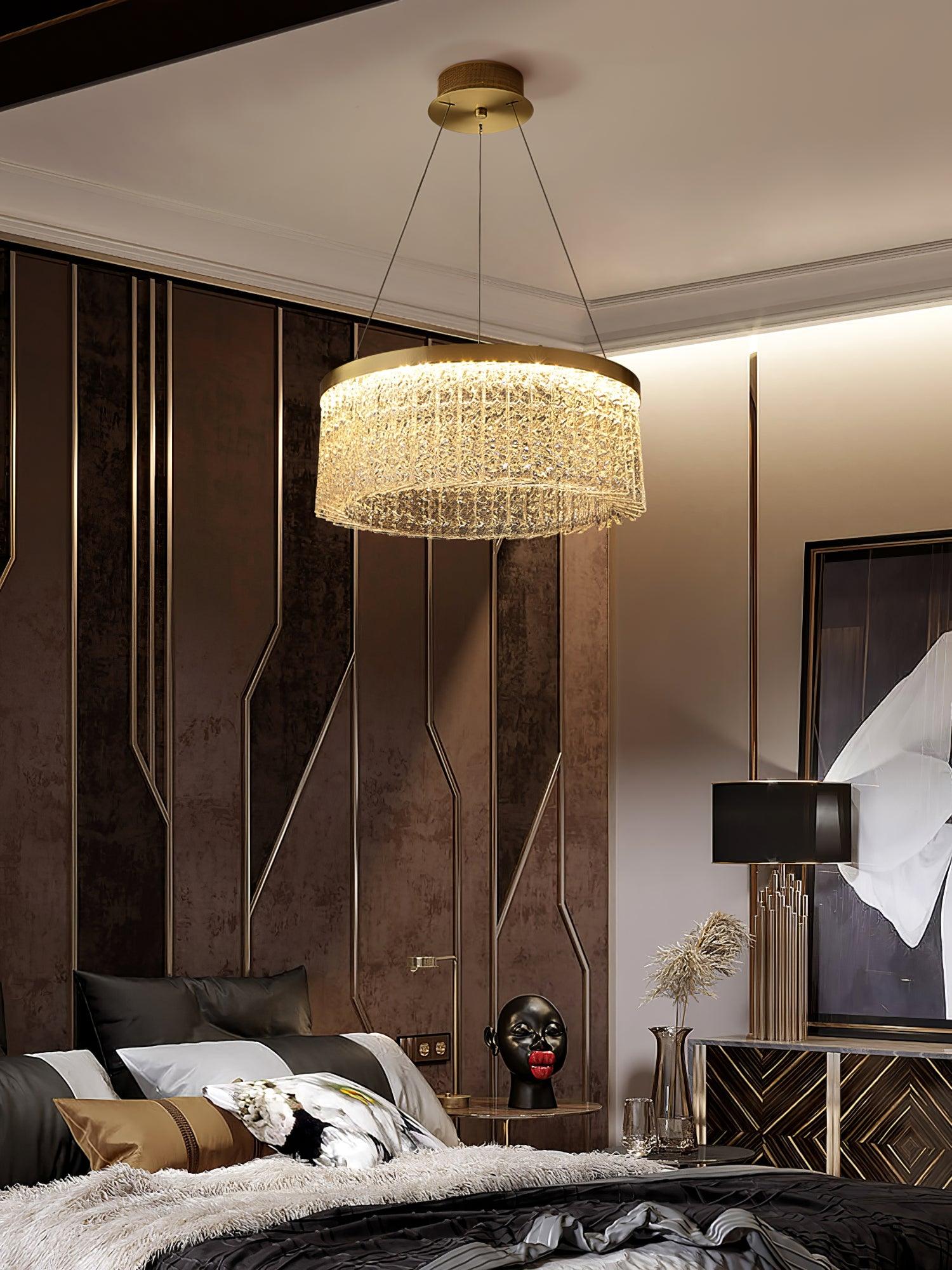 Wide dark bedroom view with illuminated ring, full canopy and wires, dark bedding, black-shade lamp and portrait