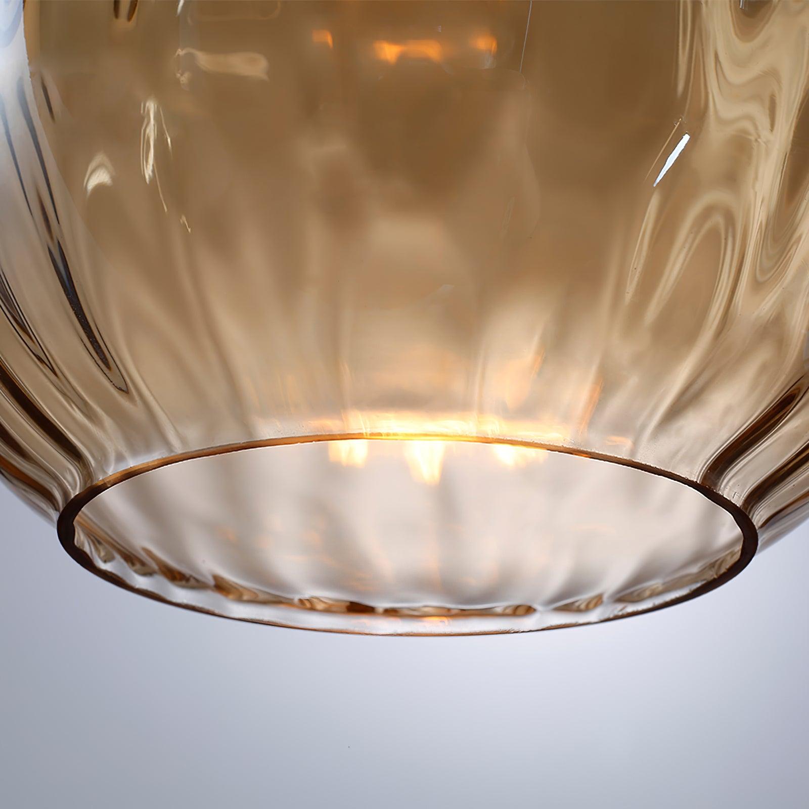 Open lower rim of the textured glass shade