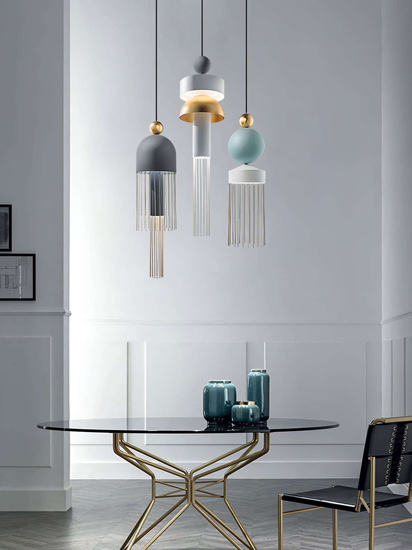 Three different tassel pendant styles above a round table