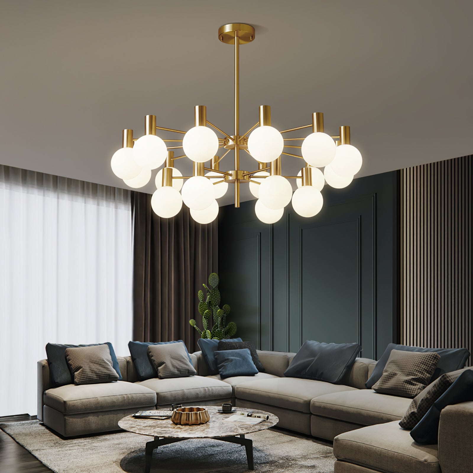 Two-tier white-globe chandelier above a grey sectional, beside teal wall panels, timber slats and a cactus.