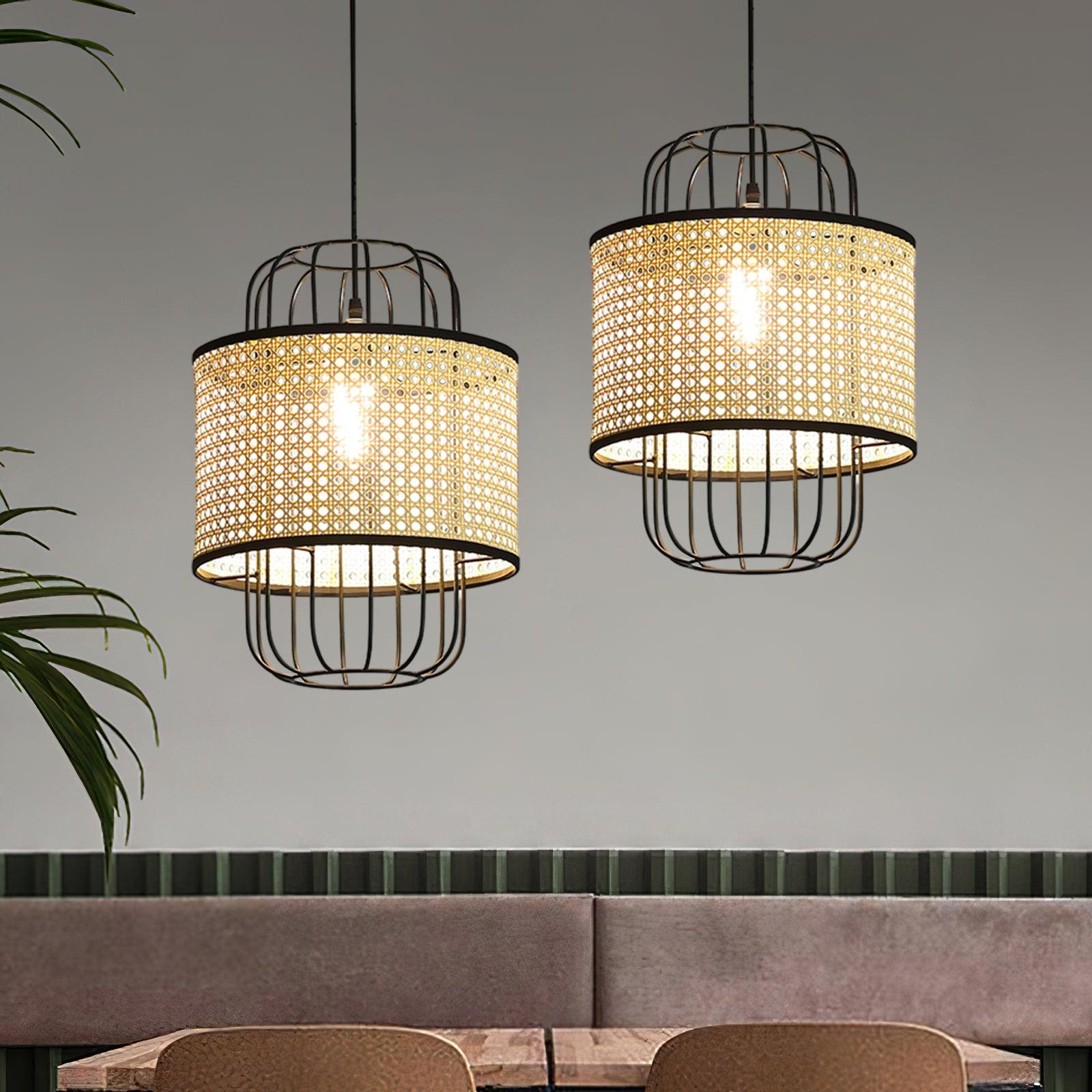 Two separate rattan cage pendants above booth seating and wooden dining tables