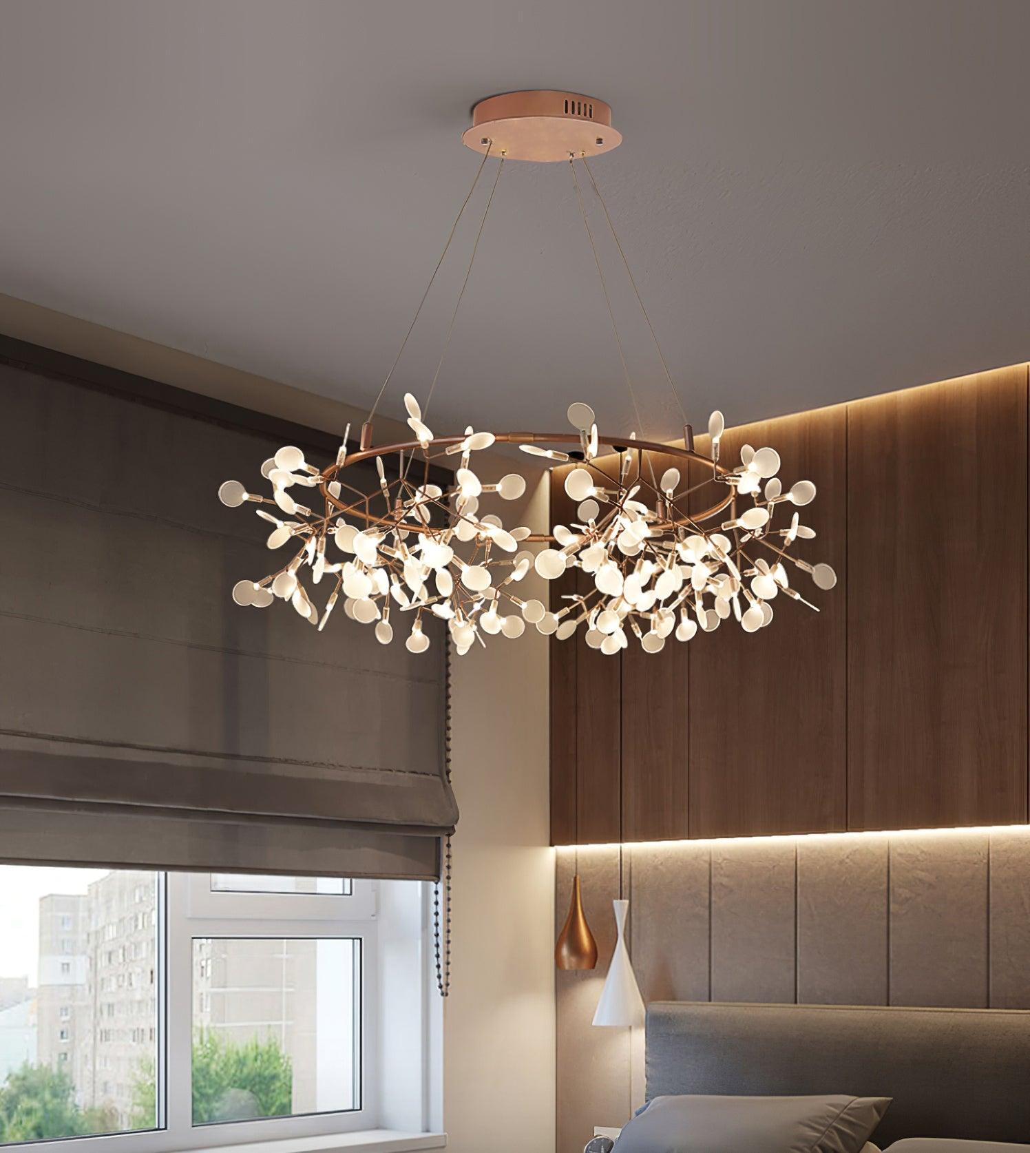 Leaf ring chandelier in a bedroom with grey window blind, timber headboard and separate bedside pendants