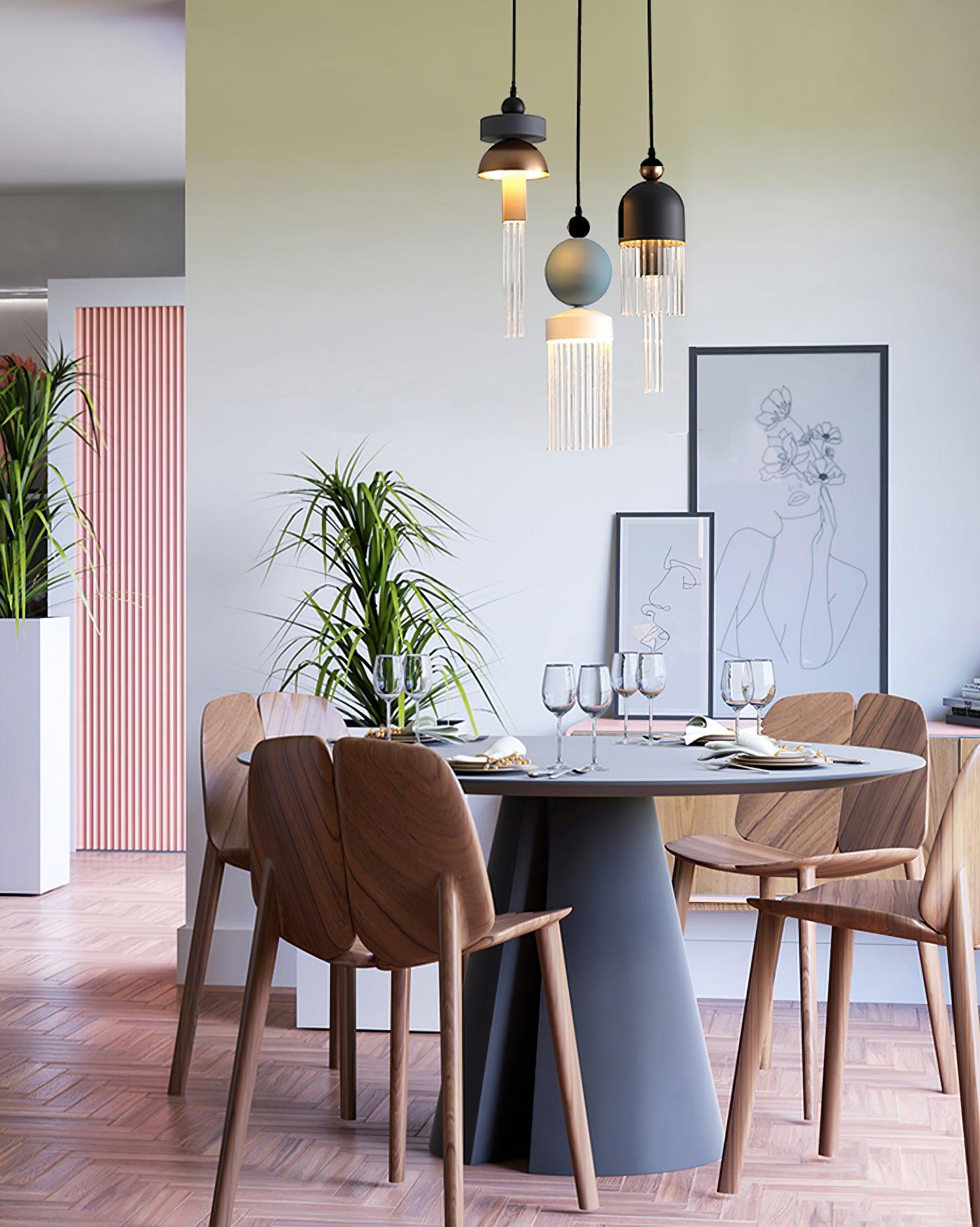 Tassel pendants above a dining table in a furnished room