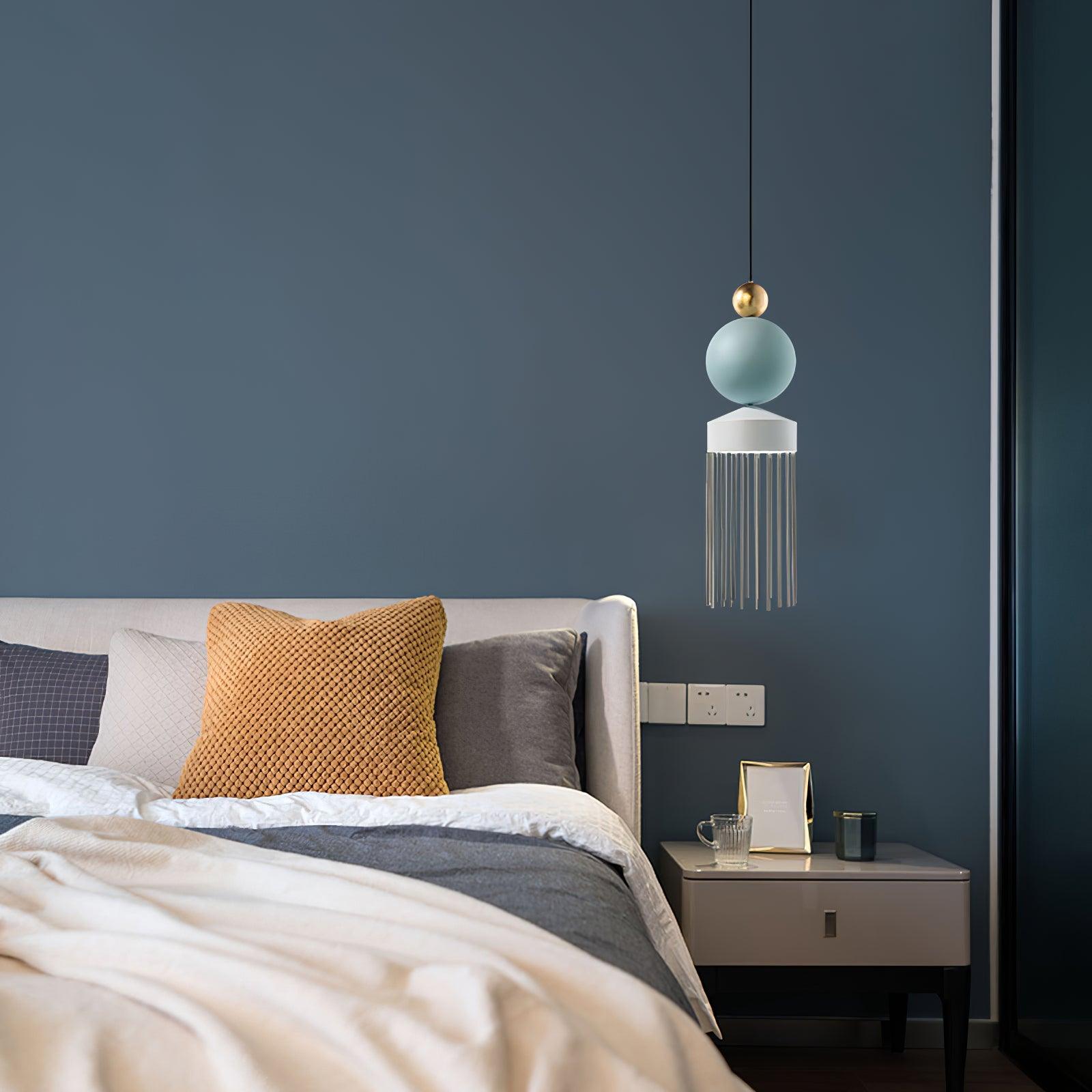 Style C blue-grey spherical detail and hanging fringe beside a bed