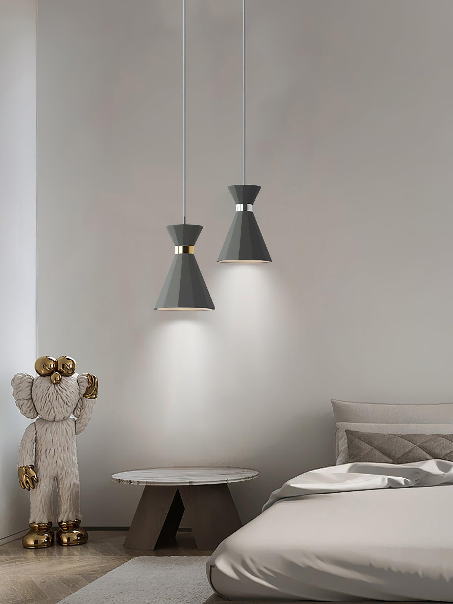 Pair of grey pendants in a bedroom