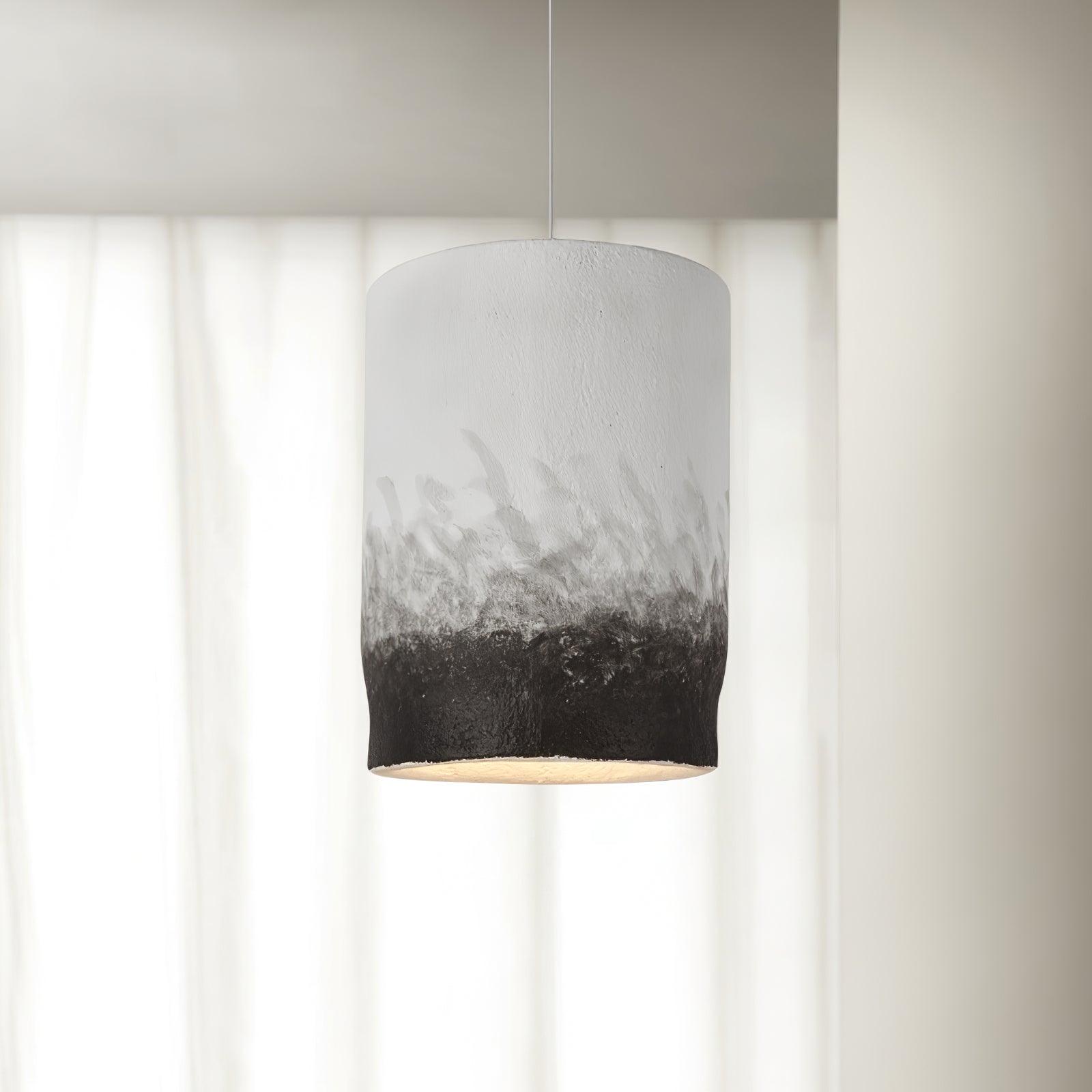Large two-tone pendant in front of light curtains