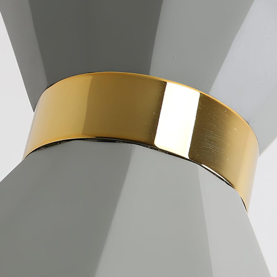 Close view of the polished gold-coloured band and grey facets