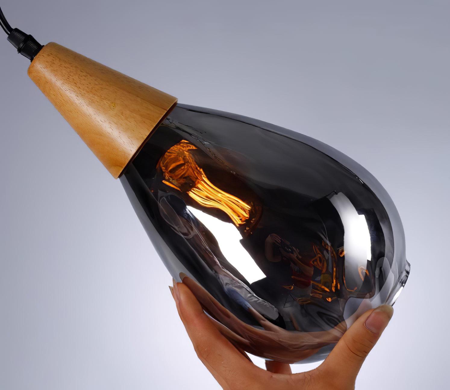 Tilted smoky glass shade with wood-colour cap