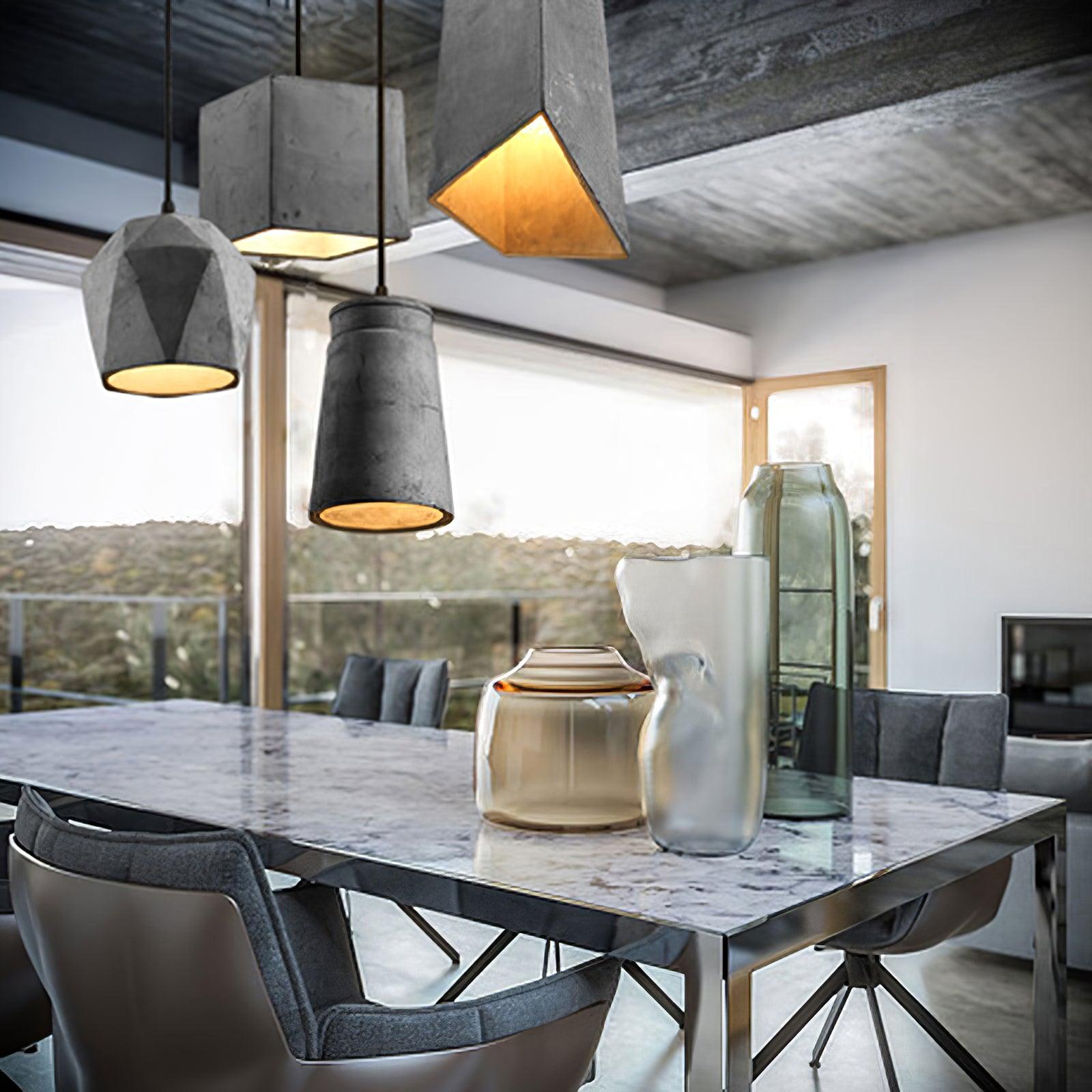 Mixed cement shade shapes above a table