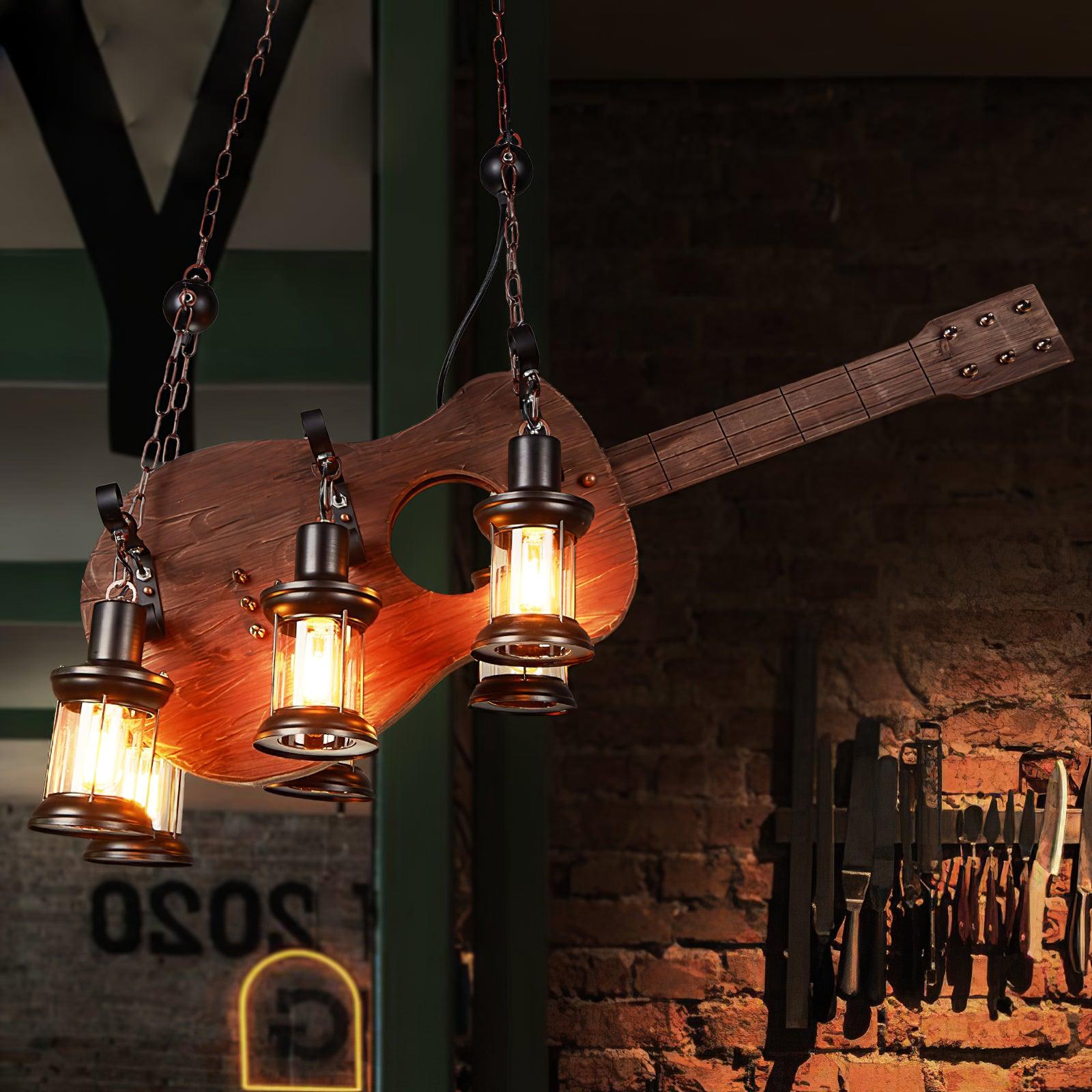 Four lanterns below a guitar-shaped body