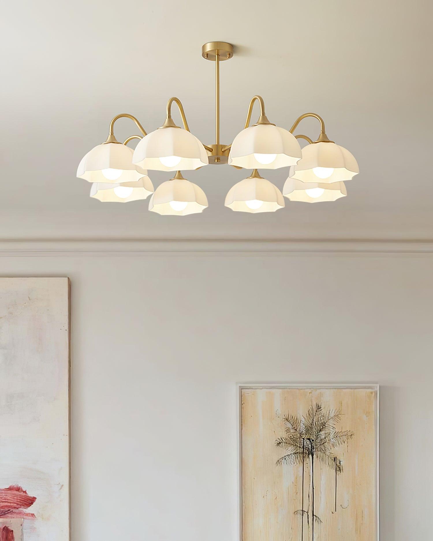 Multi-shade brass chandelier in pale living room