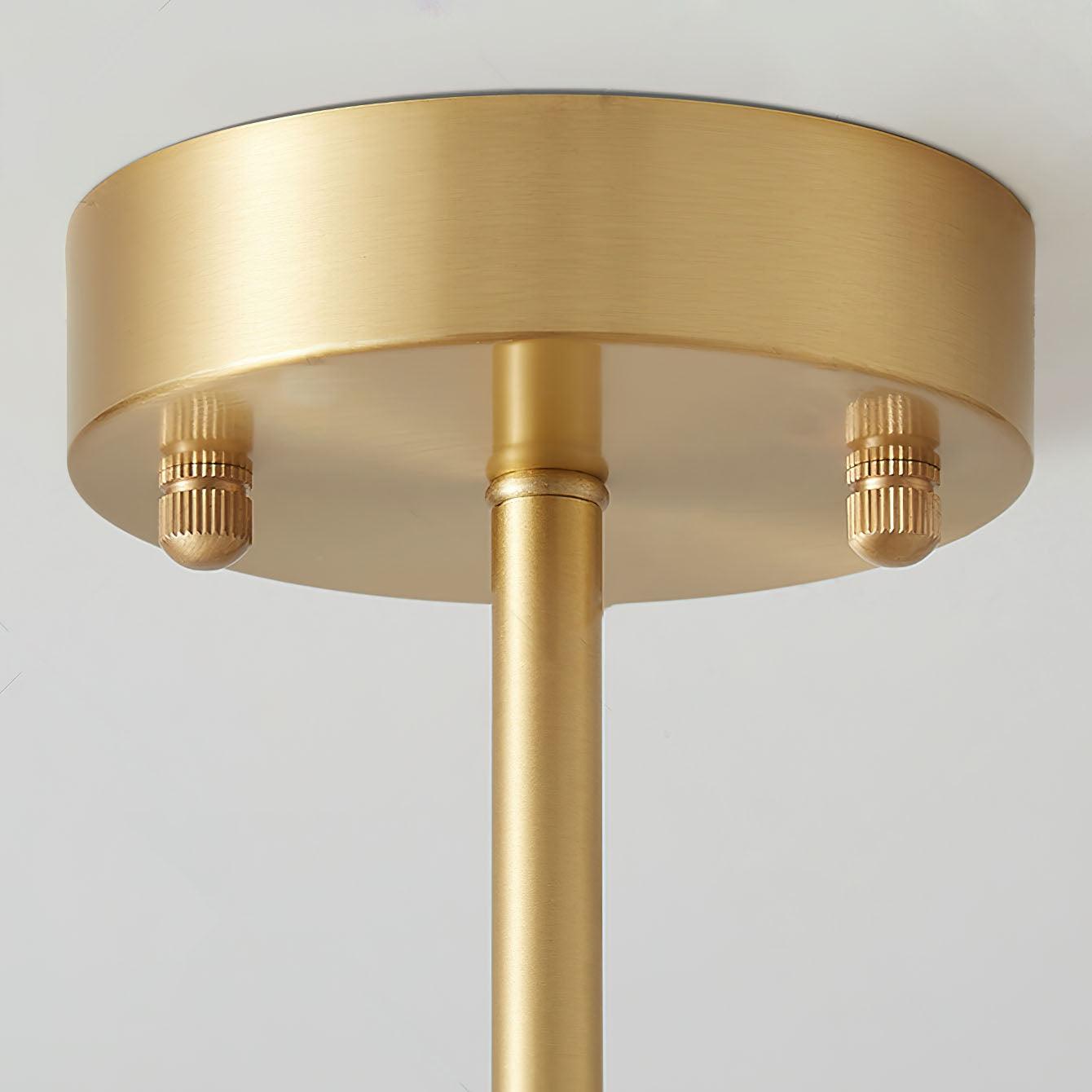 Round brass ceiling canopy and downrod close view