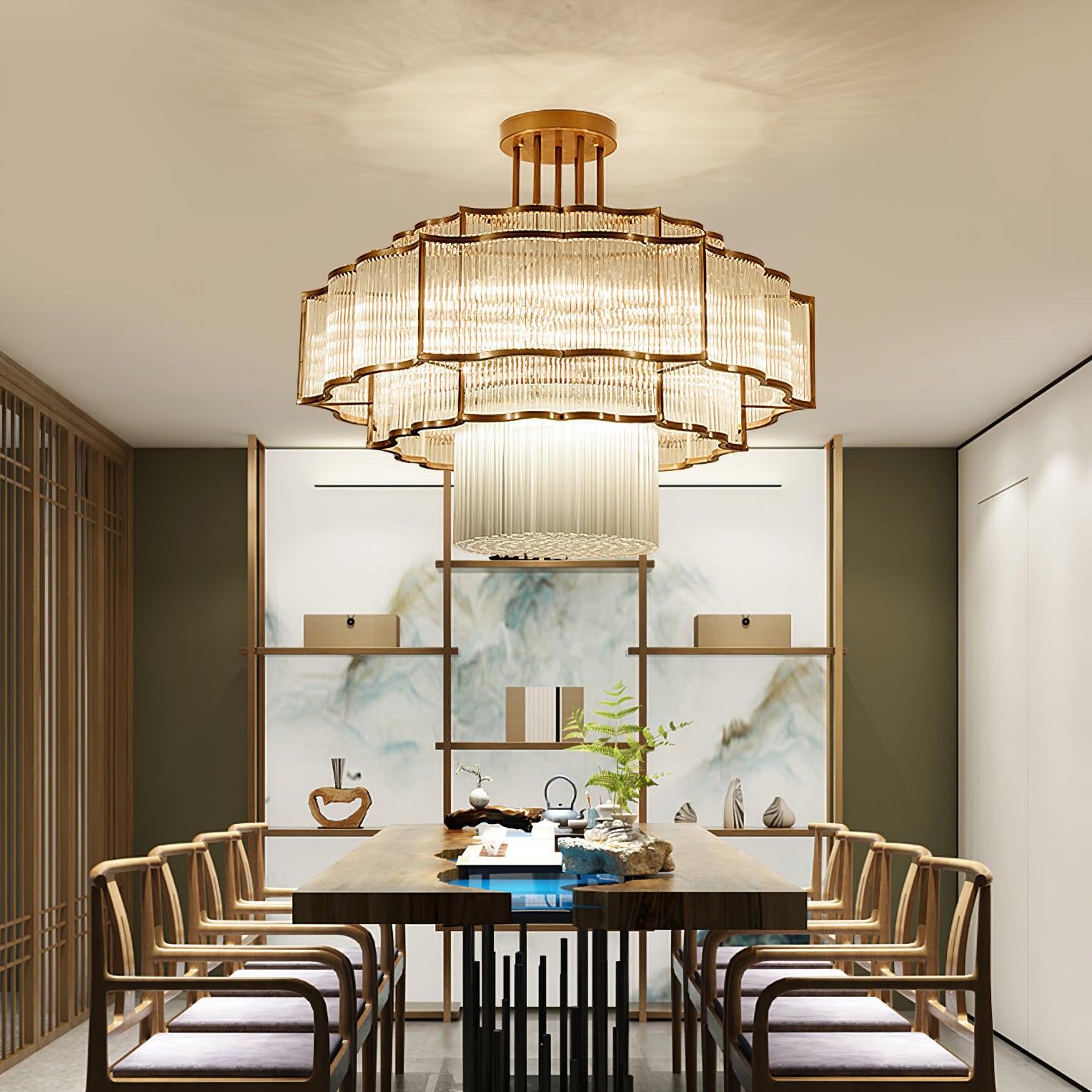 Pharo II tiered chandelier with clear ridged elements and a scalloped metal frame