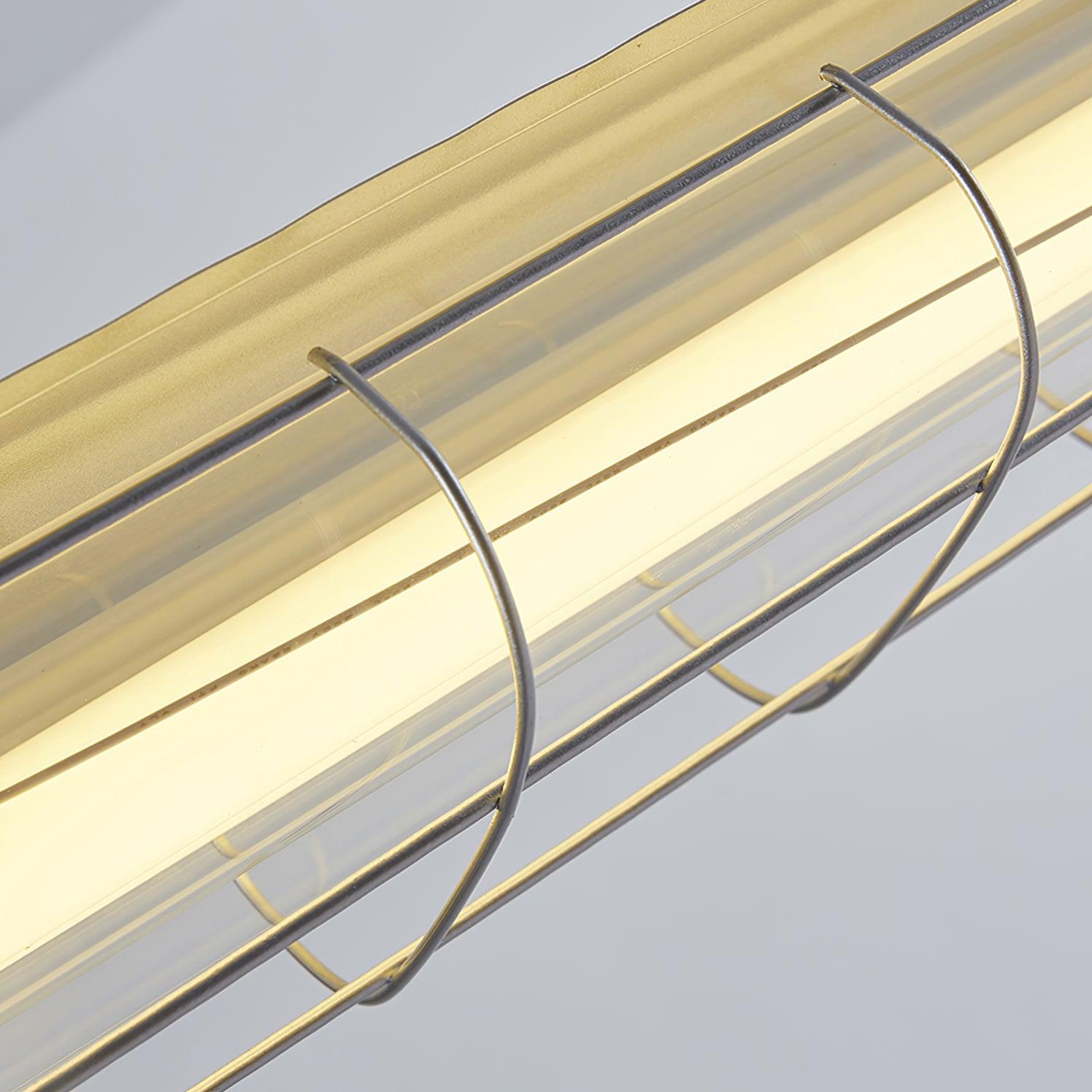 Close view of illuminated Artisan Glass panels and curved metal retaining loops along the frame