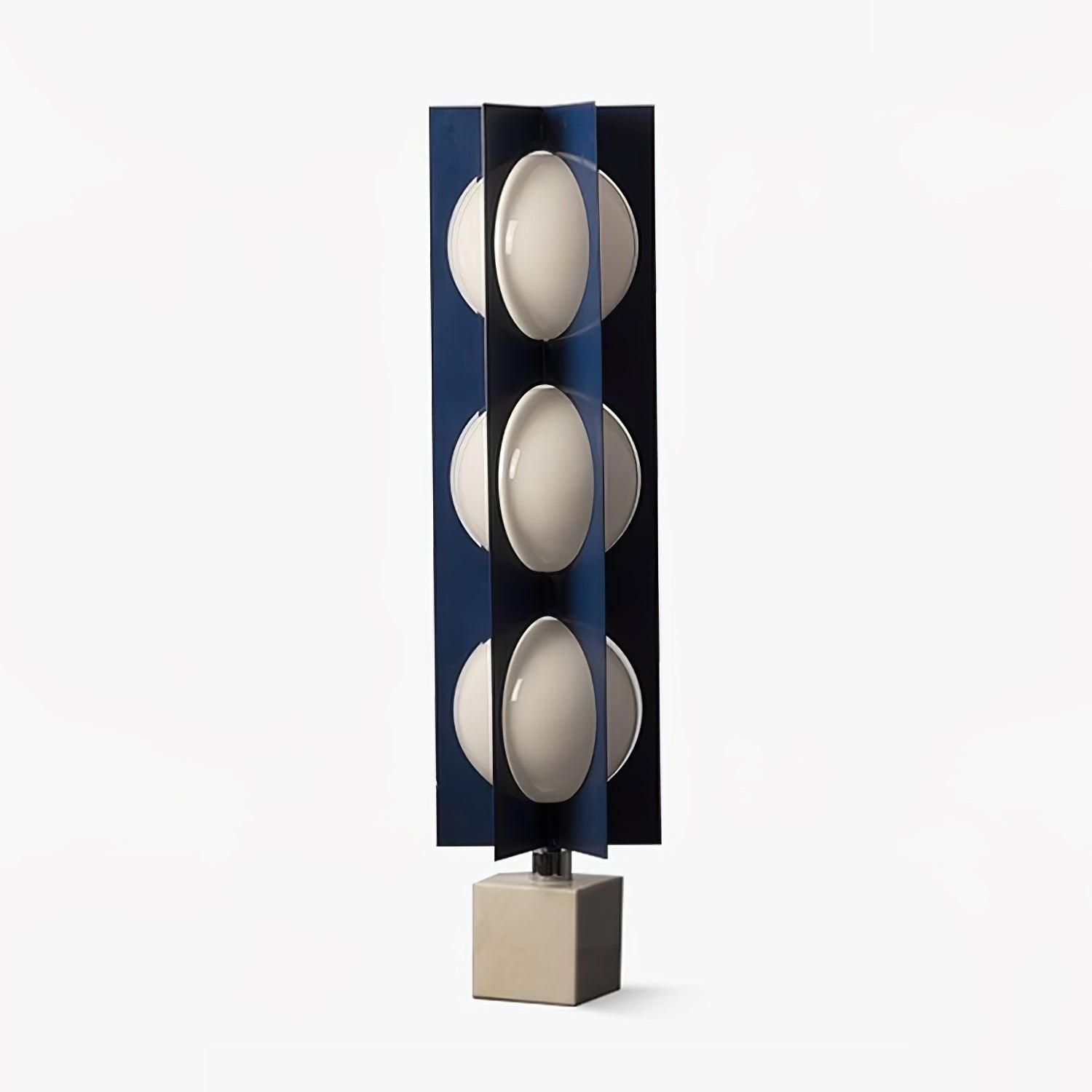 Full isolated unlit blue column lamp with three stacked white shade levels and a marble block base
