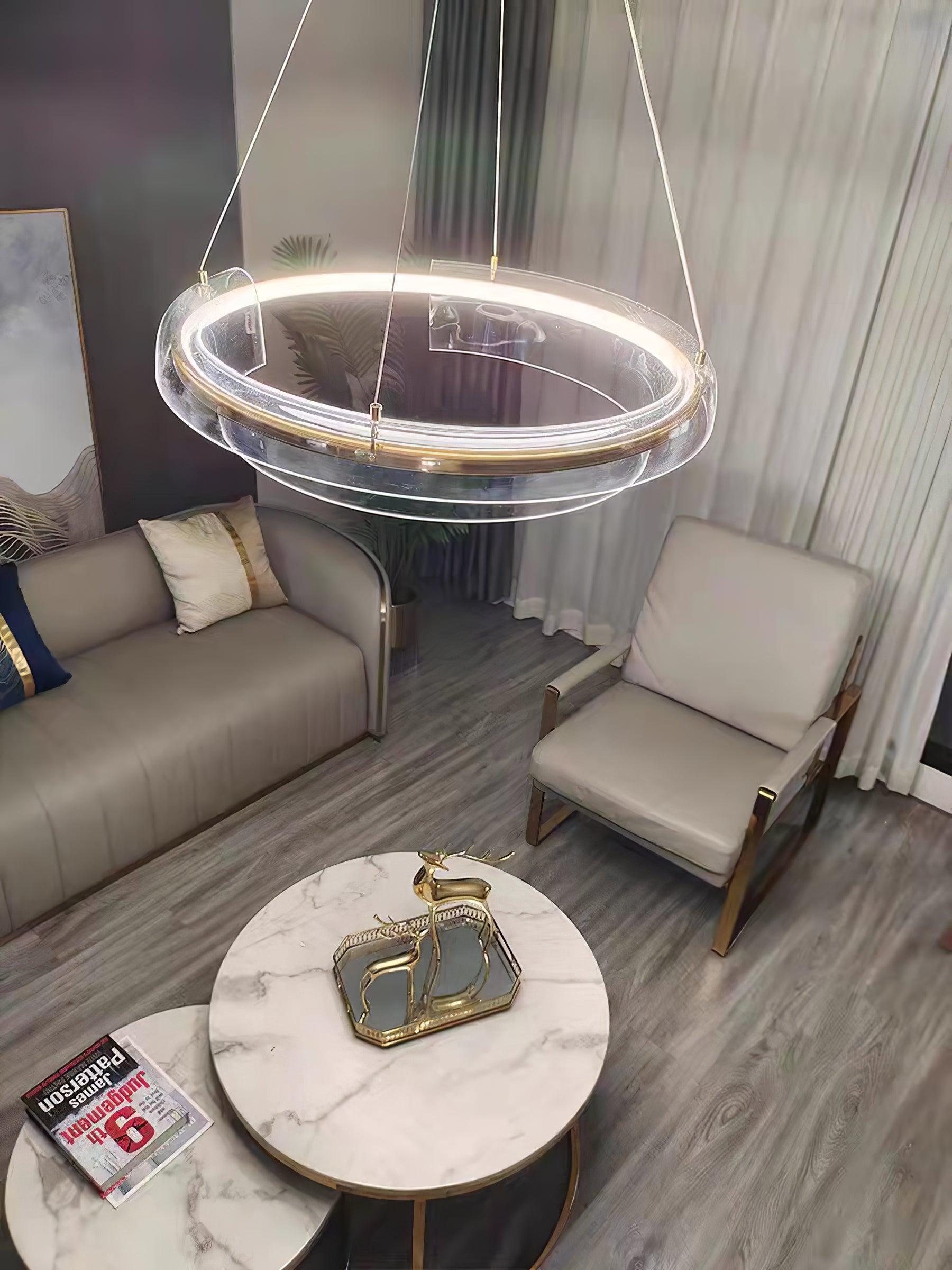 High room view of a ring chandelier over a small table