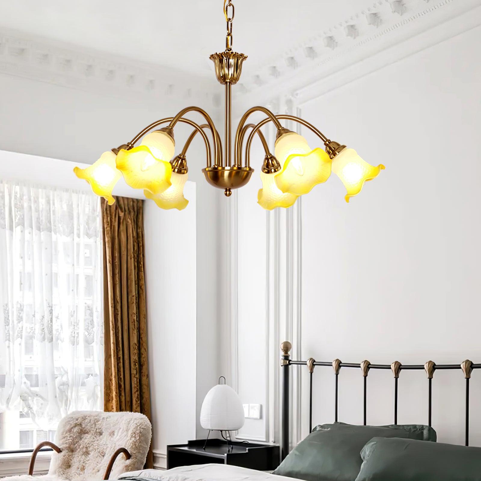 Yellow flower chandelier above a bedroom