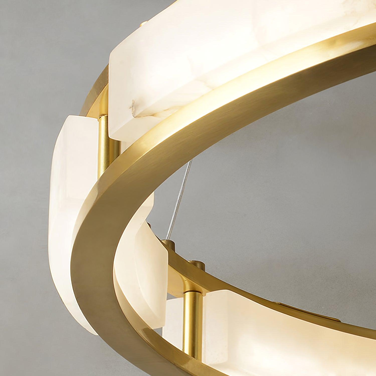 Close-up of veined alabaster panel and brass frame on Qatar