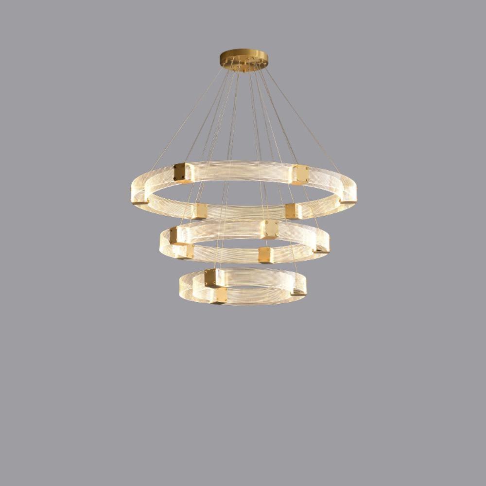 Three-tier round acrylic LED chandelier with gold-tone connectors and fine suspension wires