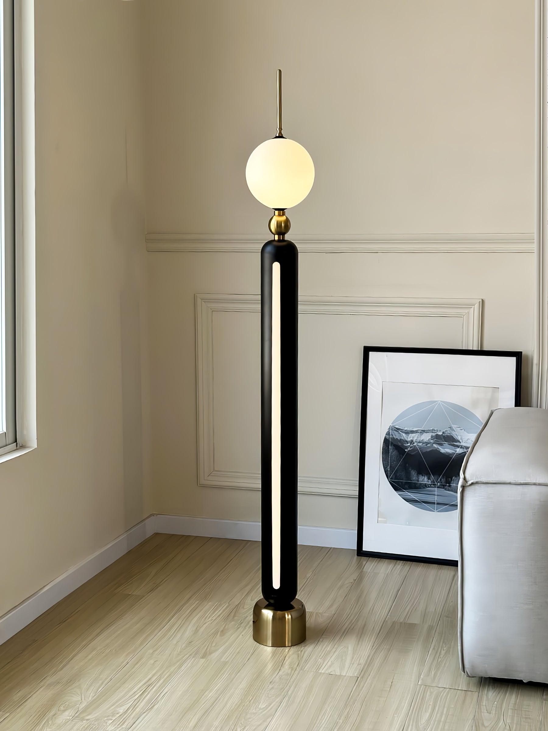 Lightning Rod chrome floor lamp with a white globe and vertical light strip
