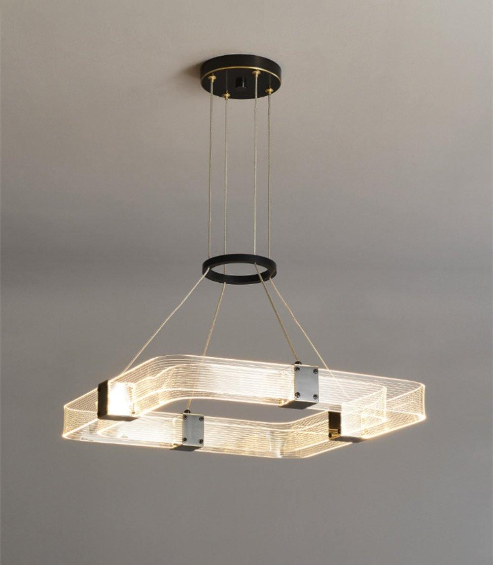 Parallel LED chandelier with textured acrylic bands and gold-tone connectors