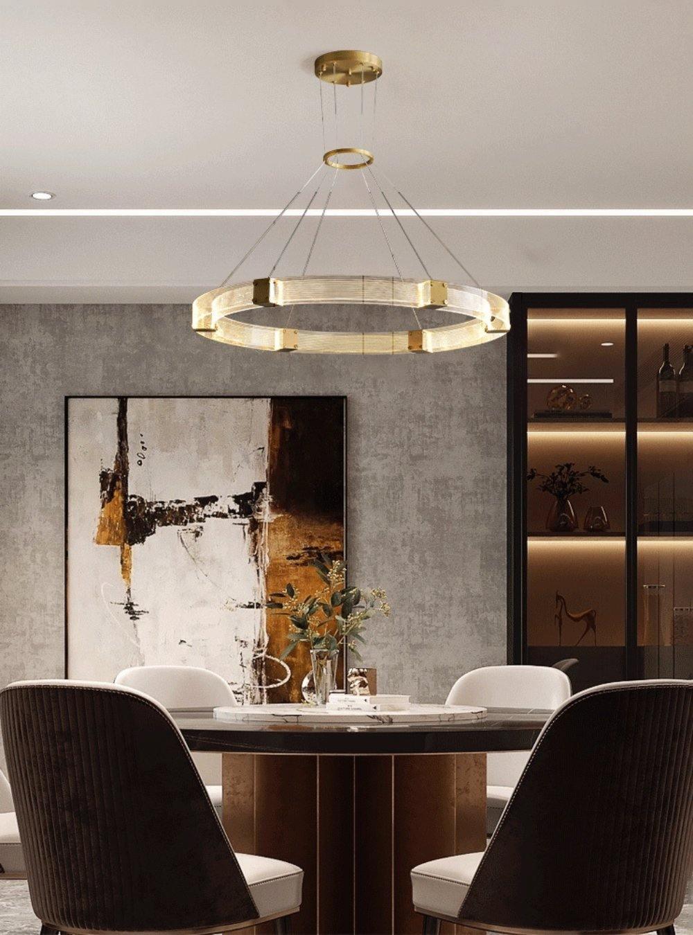Parallel LED chandelier with textured acrylic bands and gold-tone connectors