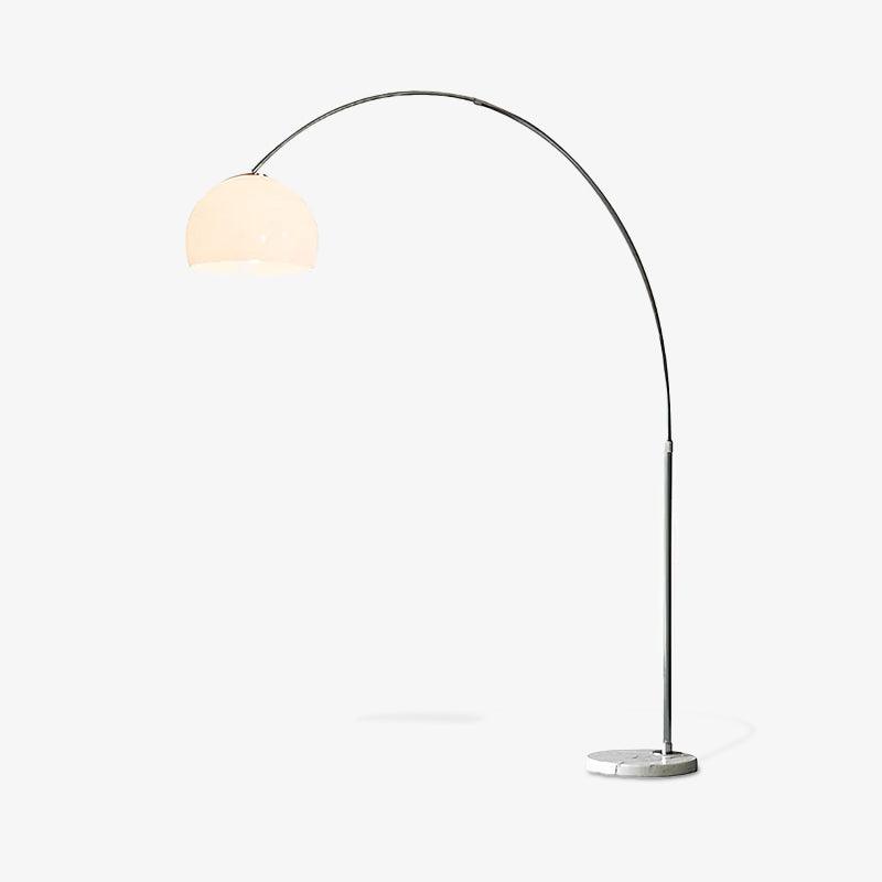 Angled white dome arc floor lamp on pale background with round marble base and cast shadows