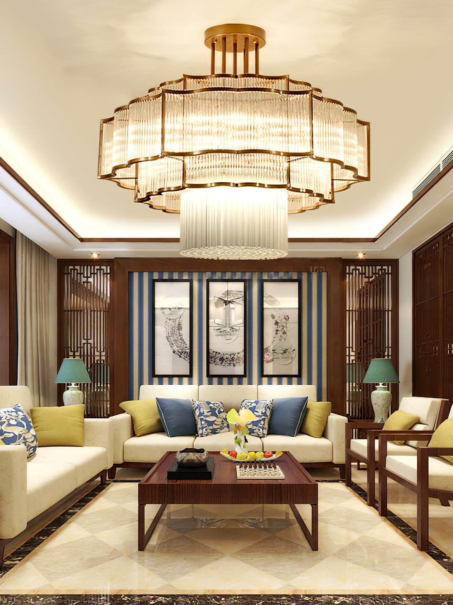 Pharo II tiered chandelier with clear ridged elements and a scalloped metal frame