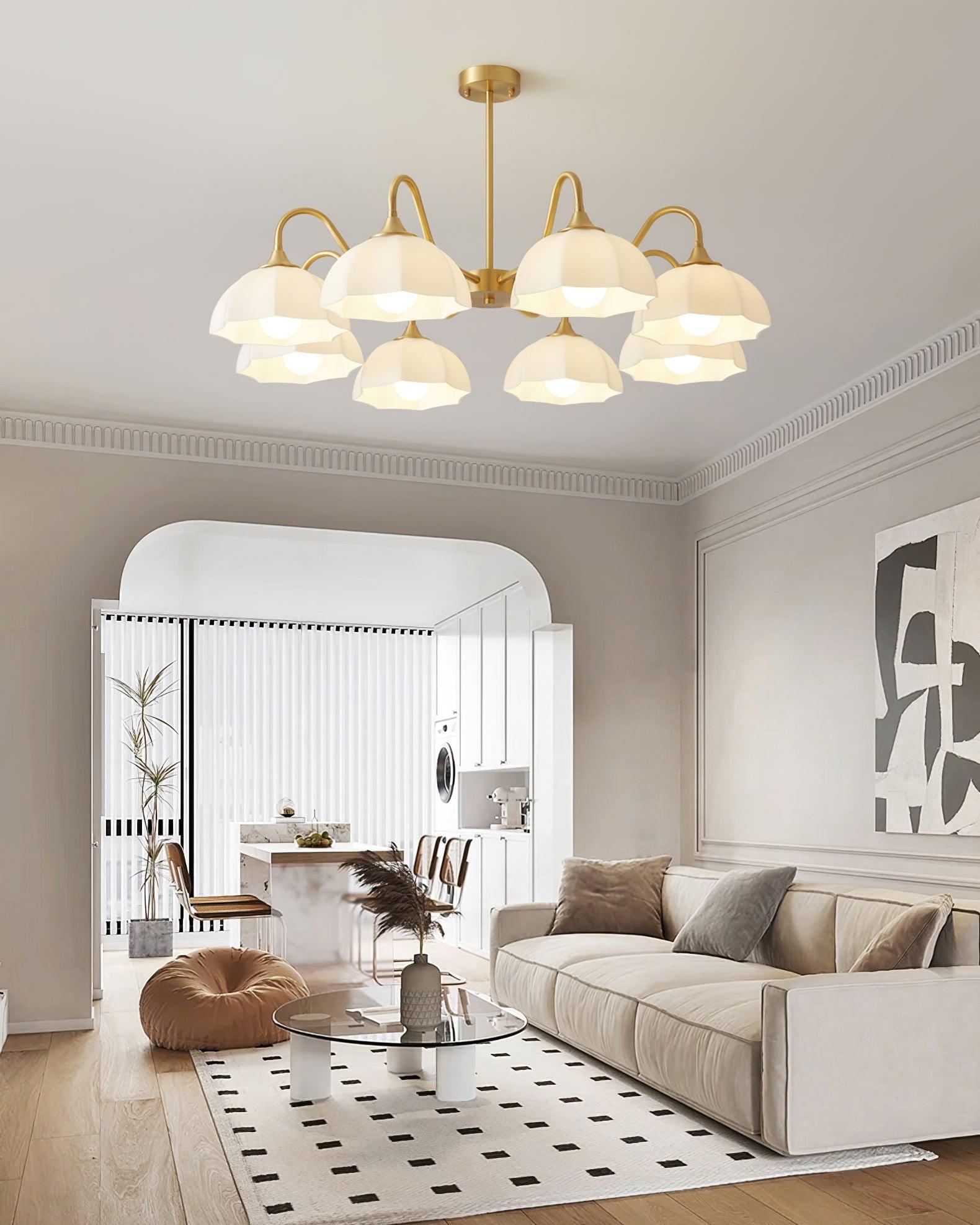 Down-facing white glass chandelier in light living room