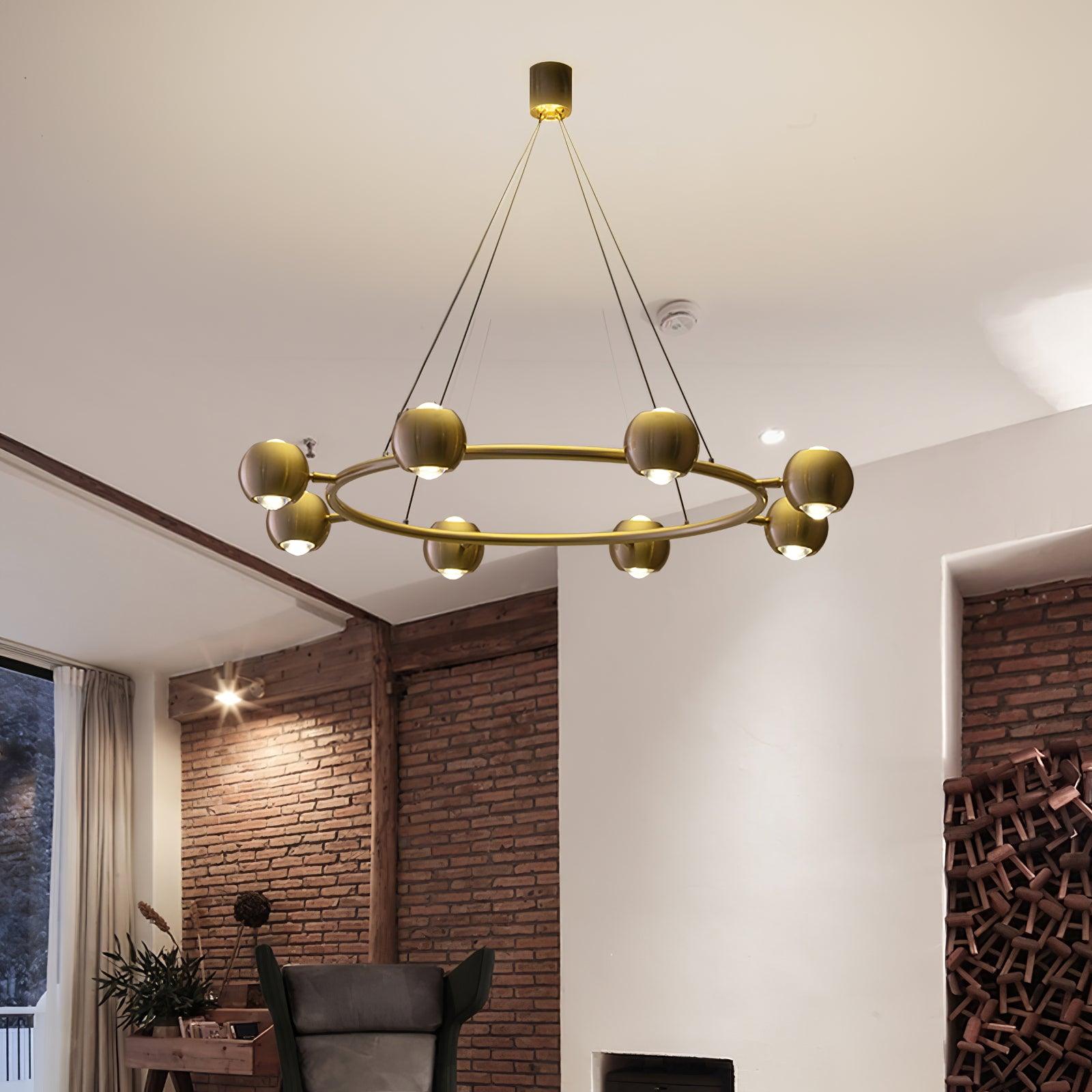 Brass spherical-head ring chandelier in a living room