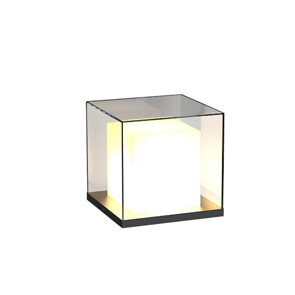 Wired version of the glass cube light with a plain clear top, glowing white inner cube and dark base on white