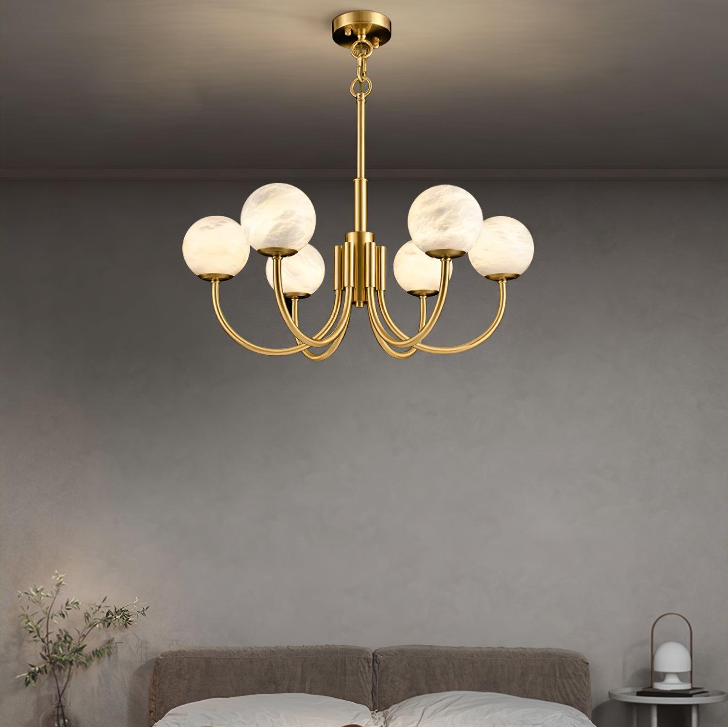 Six-globe chandelier in a softly lit bedroom