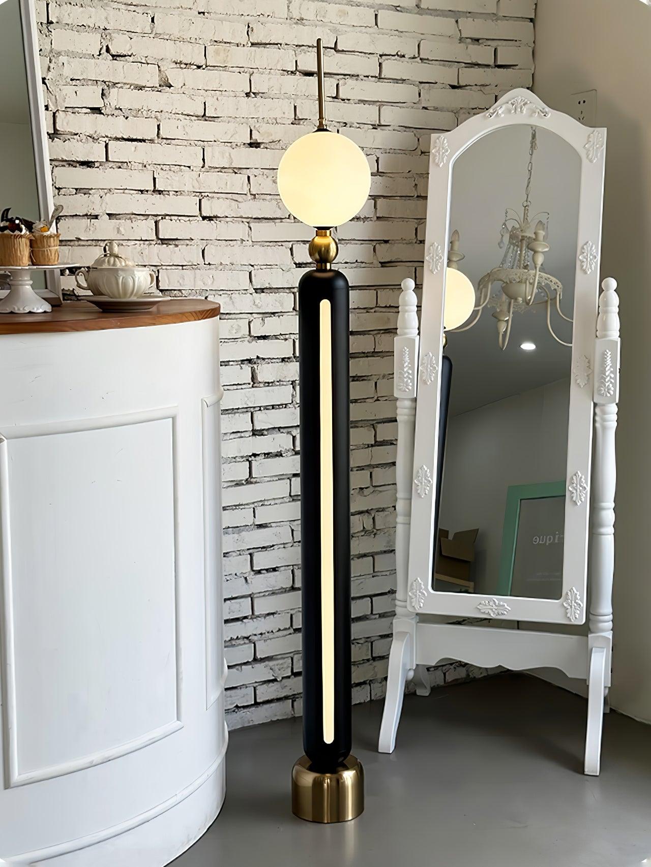 Lightning Rod chrome floor lamp with a white globe and vertical light strip