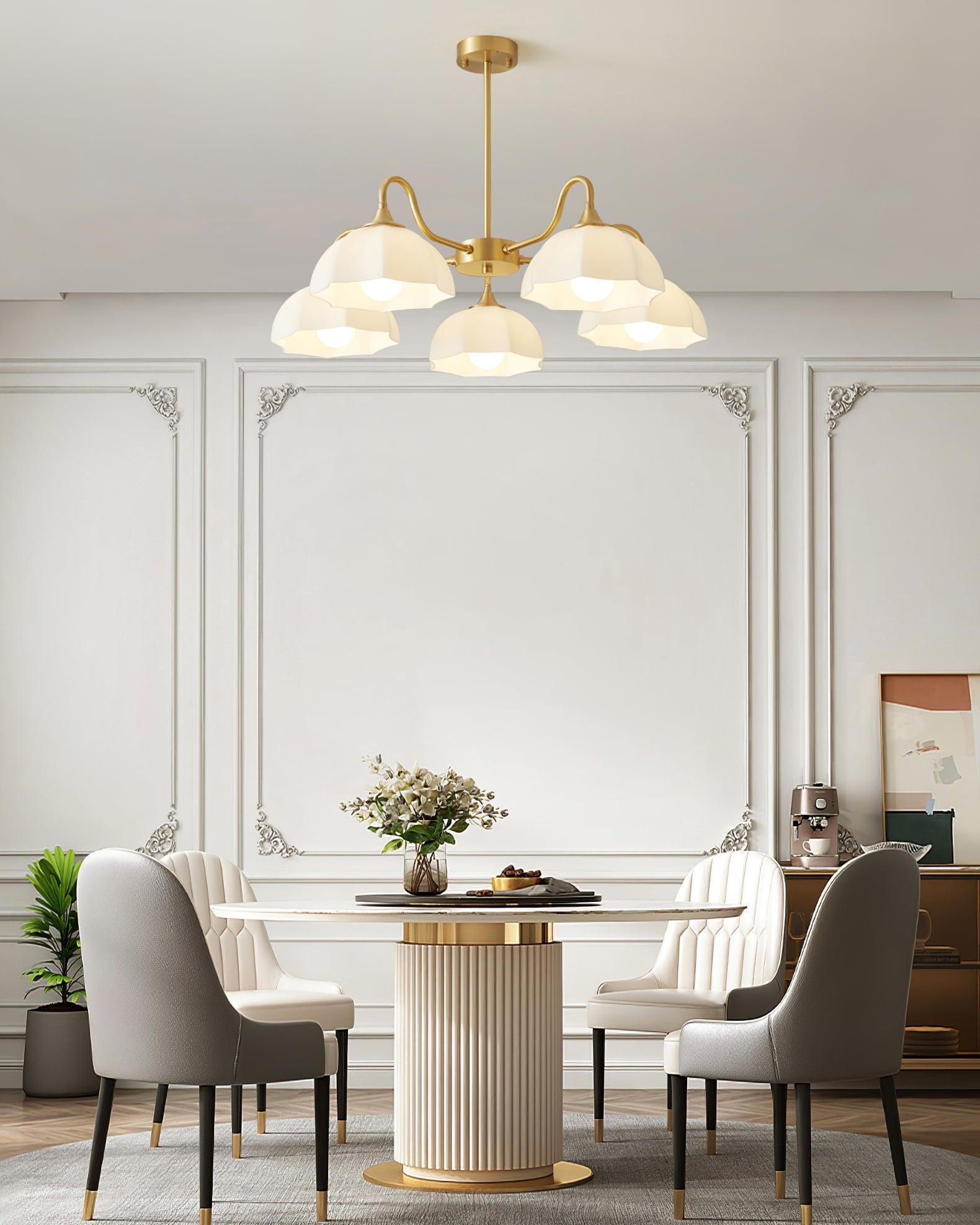 Down-facing white glass chandelier above dining table
